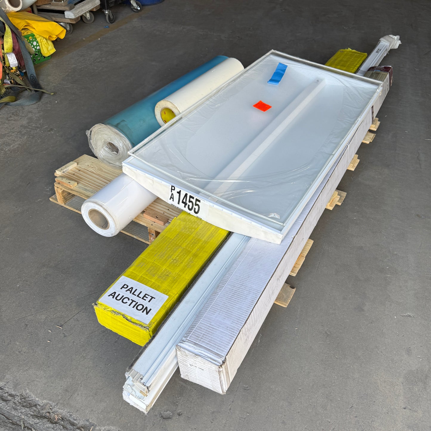 ZA@ Pallet of MIXED Rolls of Thick Blue Vinyl, Clear Vinyl, Pocket Door Frame, Lighting, & MORE! (AS-IS)