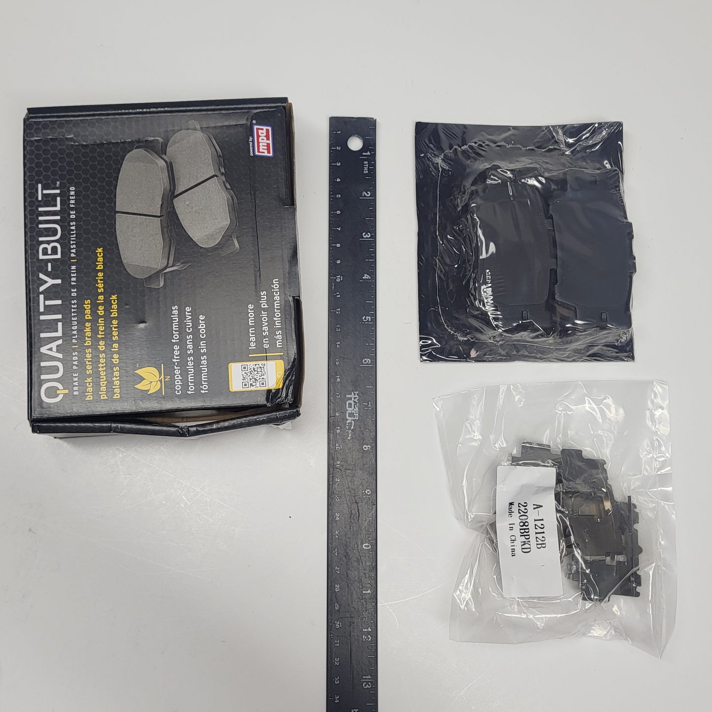 QUALITY-BUILT Ceramic Disc Brake Pad Set Black Rear 1003-1212C