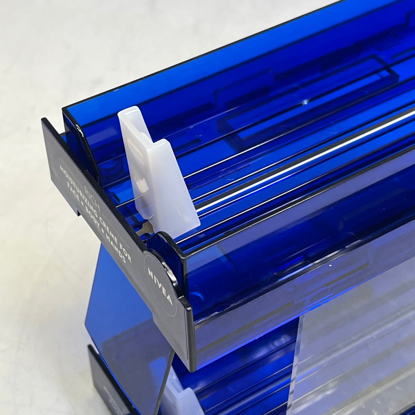 ZA@ NIVEA Round Cream Slide Dispenser 8"x7"x4" Blue/White