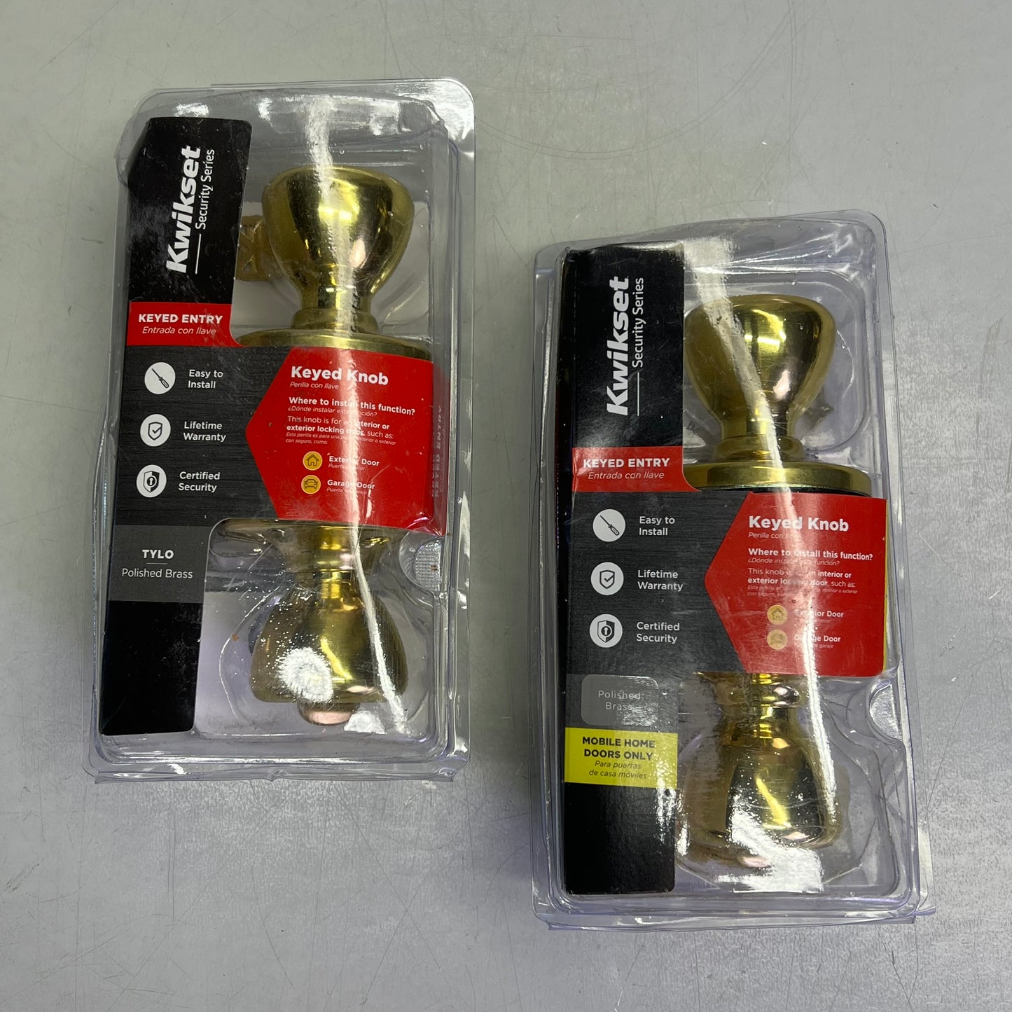 KWIKSET Tylo Polished Brass Entry Door Knob 1-1/3" Polished Brass 94002-828