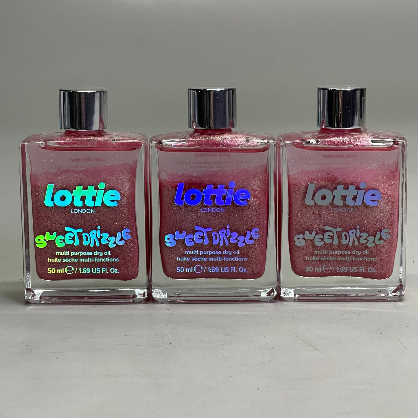 ZA@ LOTTIE LONDON (3 PACK) Sweet Drizzle Body Oil 1.69 fl oz "Pink Shimmer" SPR021 D