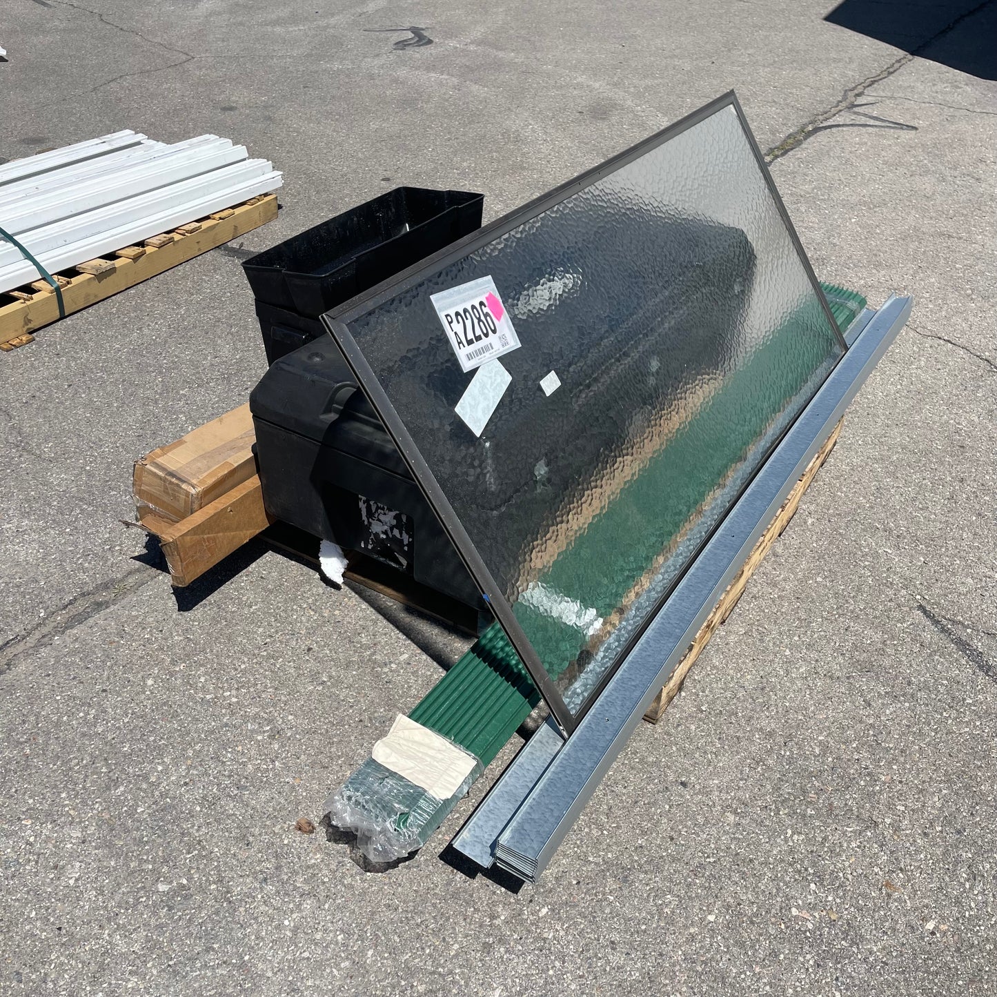 ZA@ Pallet of MIXED Glass Shower Door, Skyline Protective Case, Tool Boxes, & More! (AS-IS)