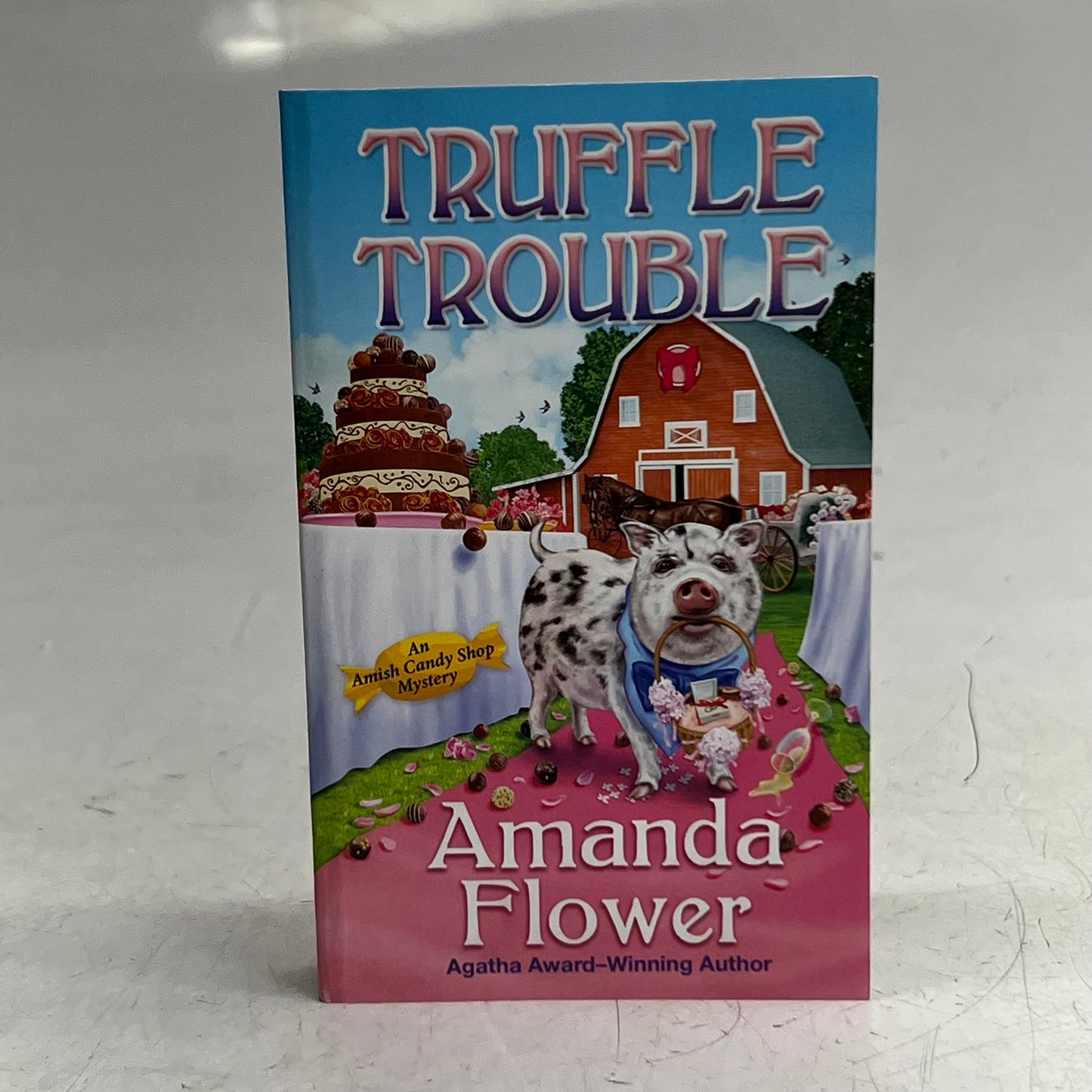 Truffle Trouble by Amanda Flower Sz 4"W x 6.8"H Pink 50999