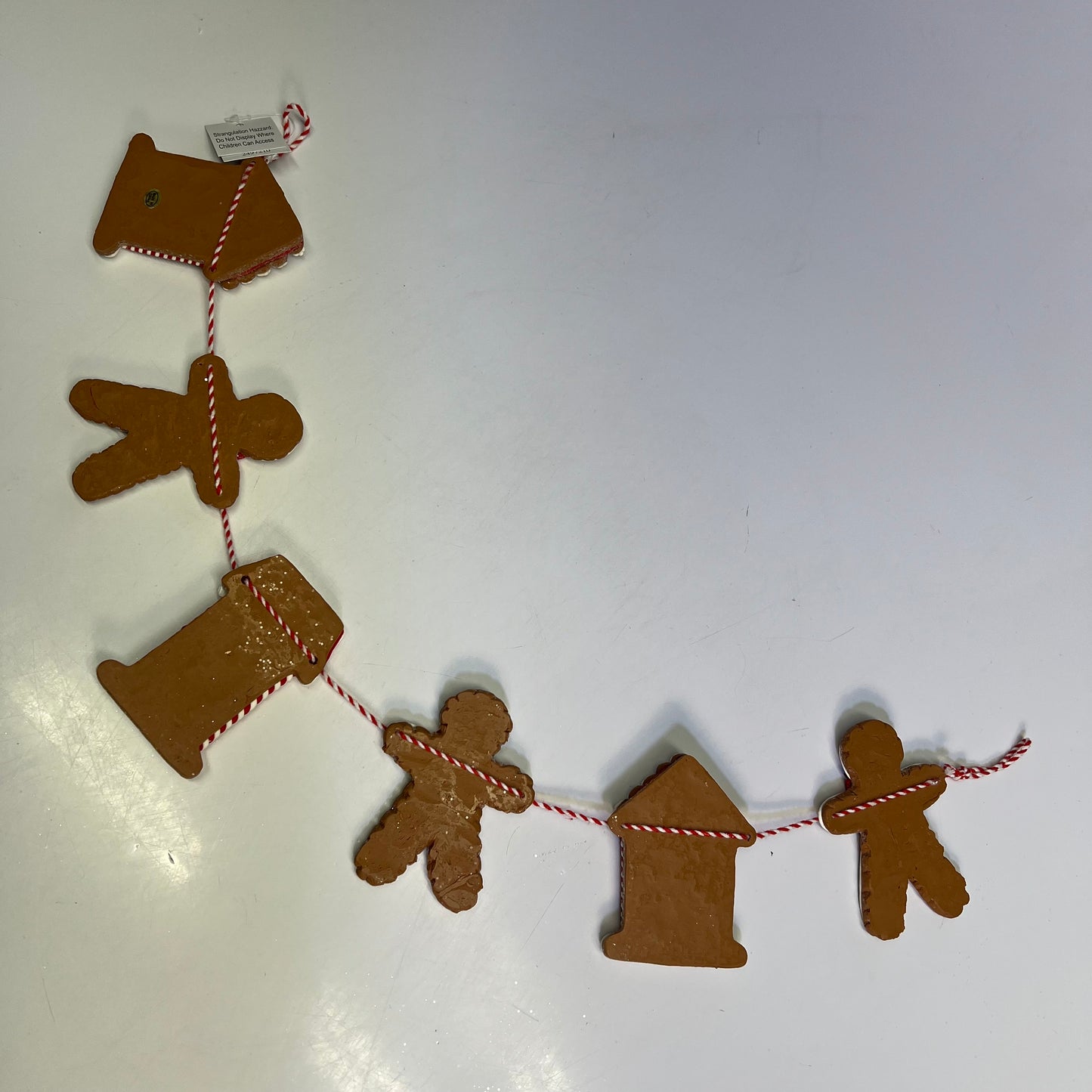 GERSON Clay Gingerbread & Houses Garland 24" L Brown/White/Red 2497210