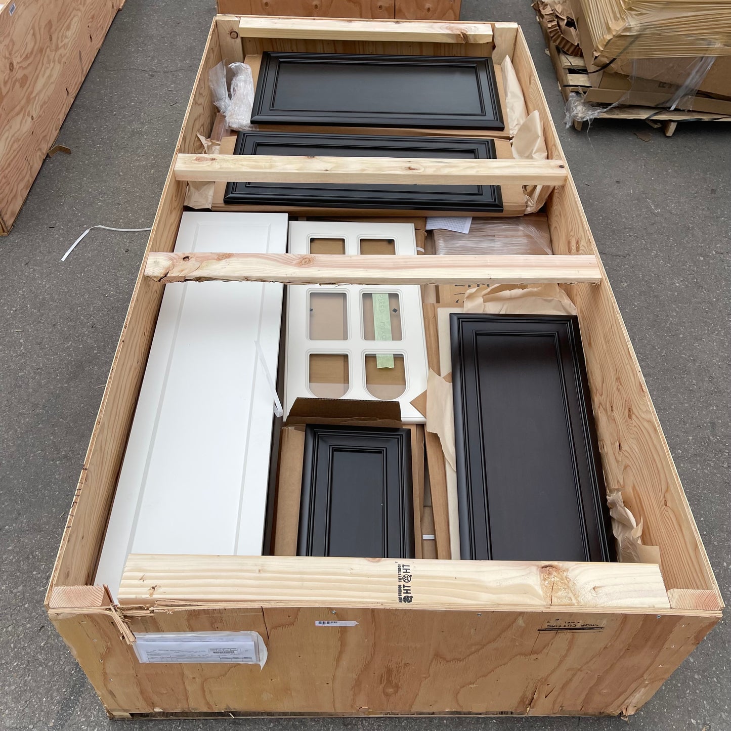 ZA@ Pallet of REBORN CABINETS Pressed Wood Cabinetry Parts Black, White, Walnut (AS-IS)