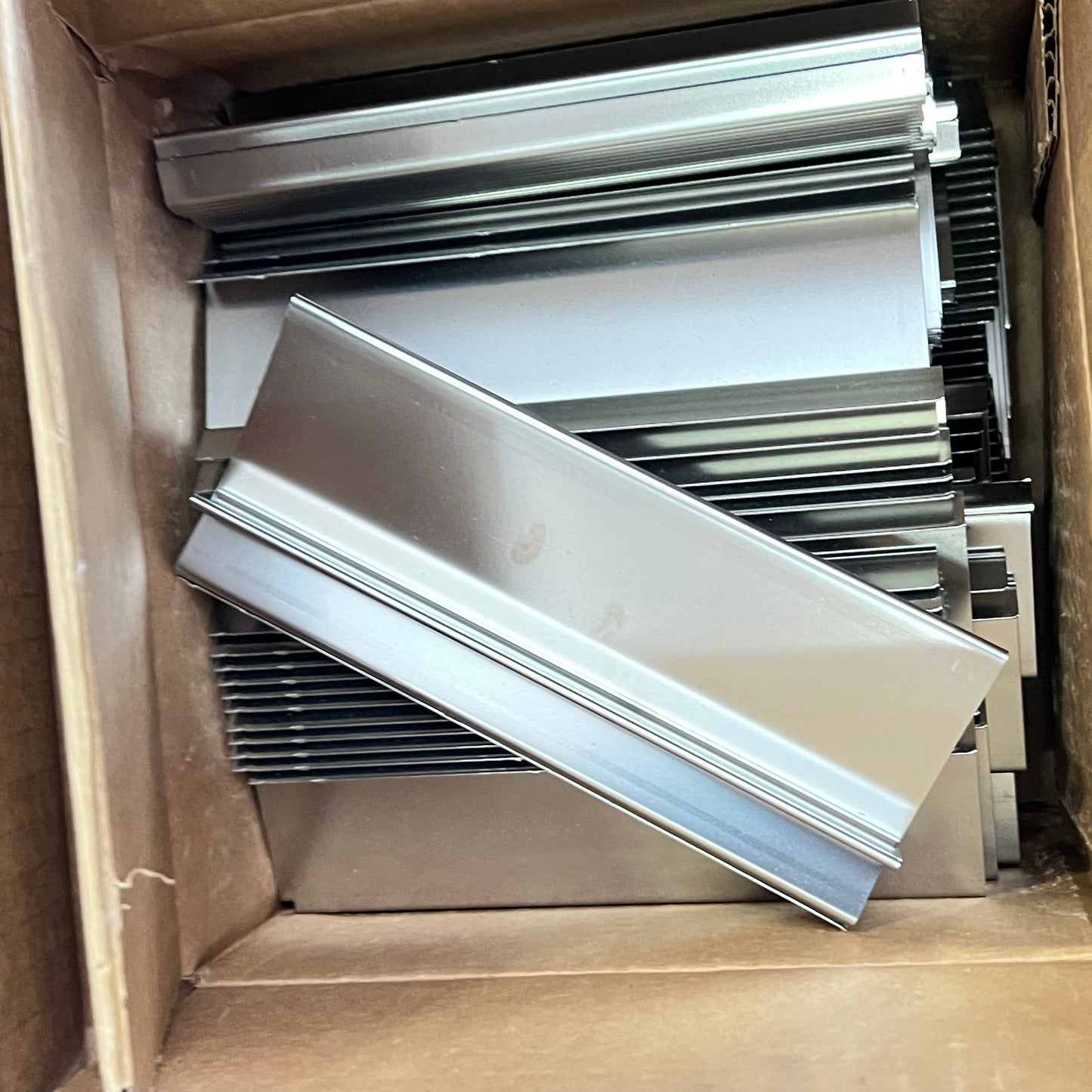 ZA@ Pallet of MIXED Hardware, Brackets, Plastic Tarp, Steel Horse Shoes, Lamination Sheets, & More!!!!! (AS-IS)