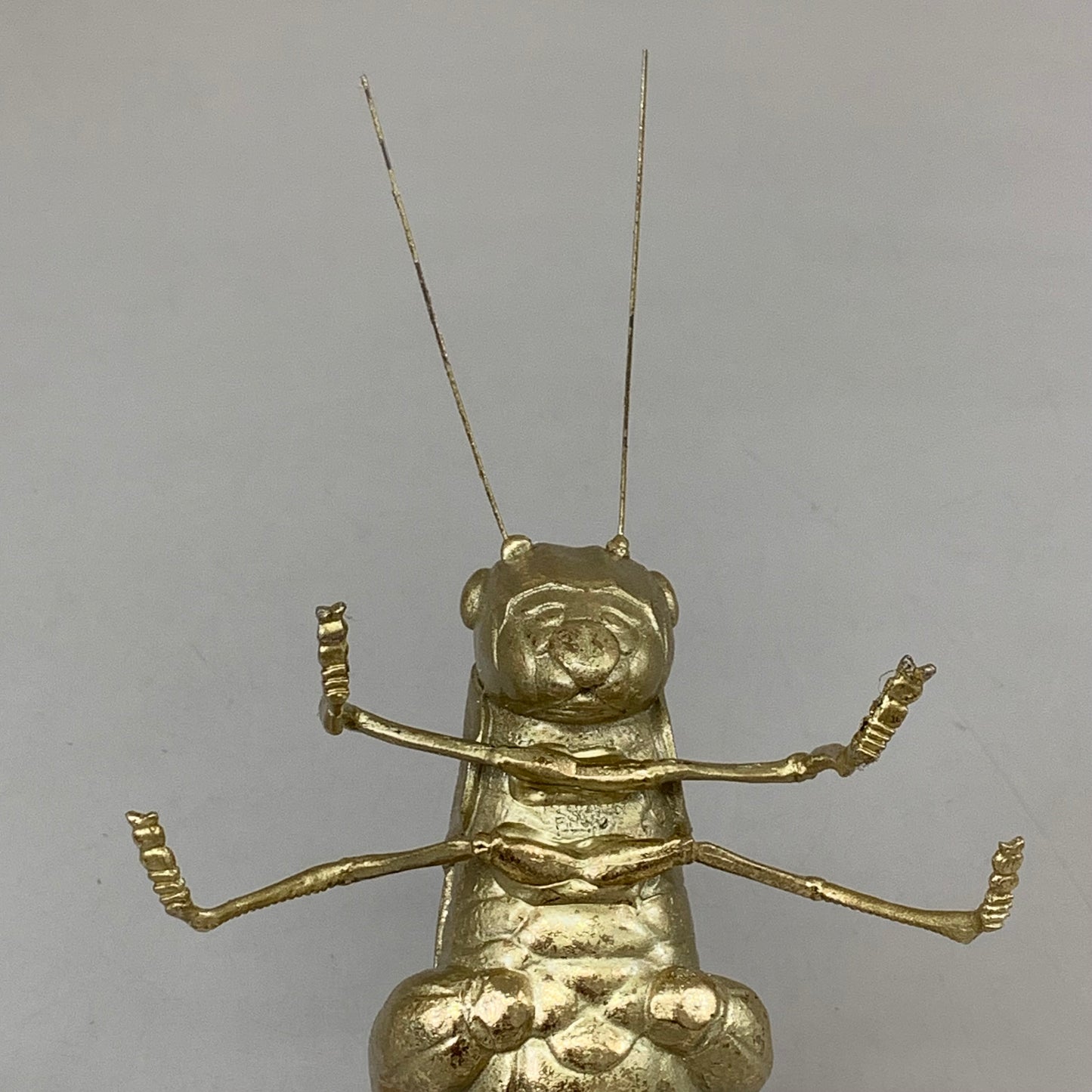 CREATIVE CO-OP Gold Resin Cricket Figurine 10"x4.5"x4.5" Overall Length Gold DF1054