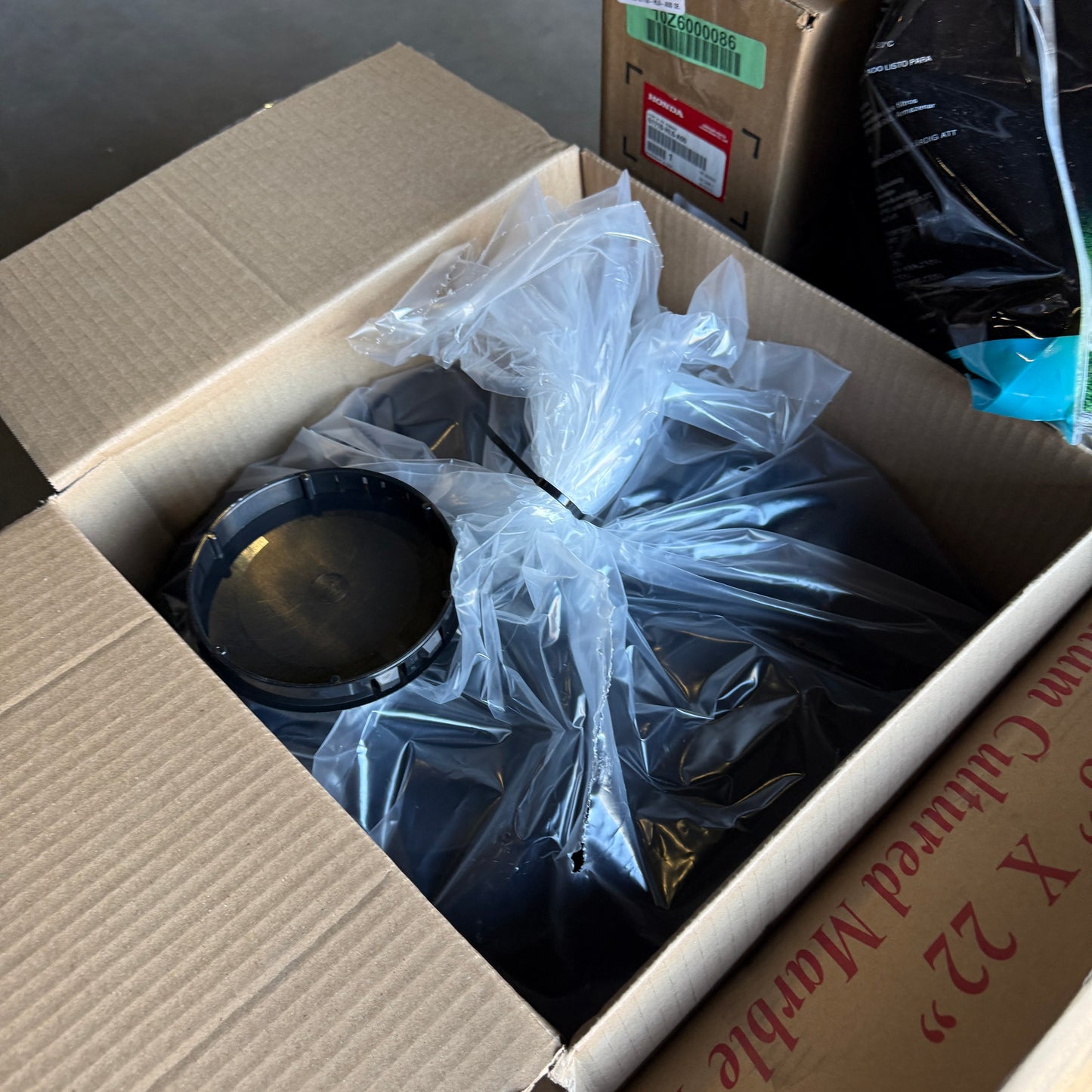 ZA@ Pallet of MIXED Rubber Trim, Currency Straps, Toilet Seat Covers, Automotive, Lighting, Honda Genuine Parts, Sink, Toner, Marking Paint,Syrup & MORE! (AS-IS)