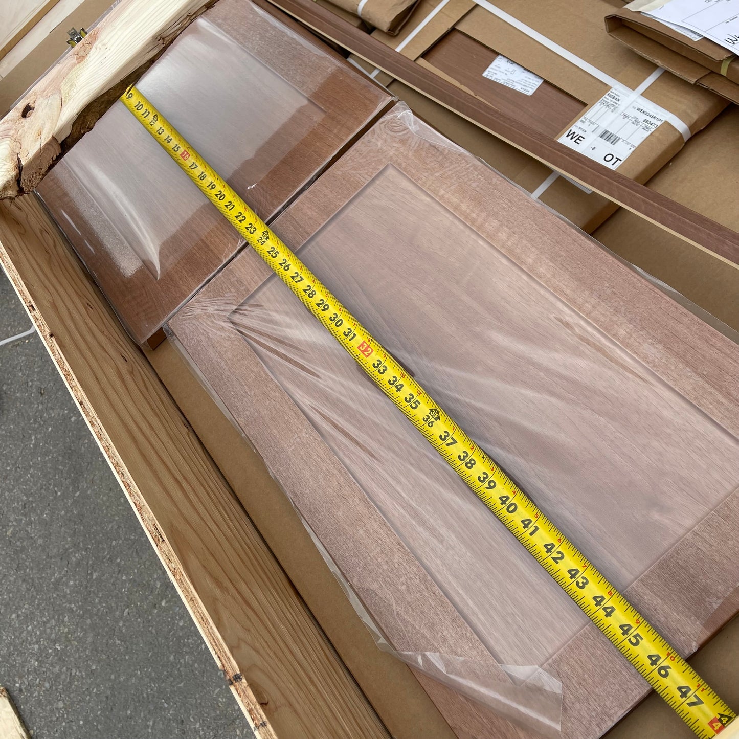 ZA@ Pallet of REBORN CABINETS Pressed Wood Cabinetry Parts Black, White, Walnut (AS-IS)