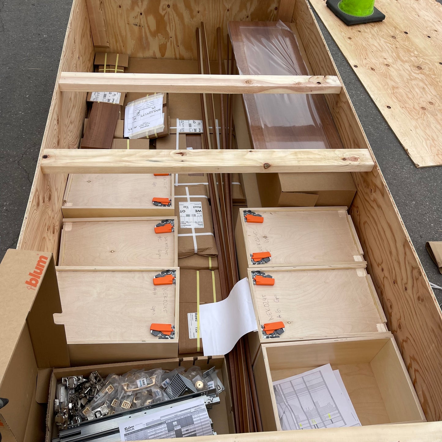 ZA@ Pallet of REBORN CABINETS Pressed Wood Cabinetry Parts Black, White, Walnut (AS-IS)