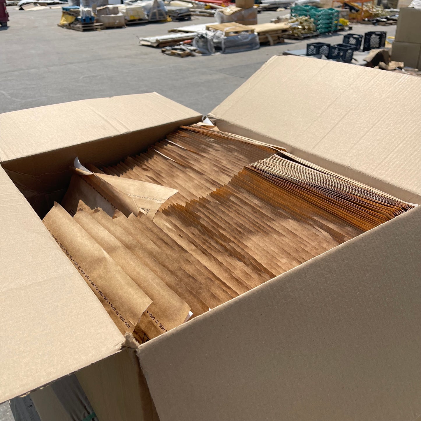 ZA@ Pallet of TARGET Cardboard Boxes, Mailers, & Kraft Paper Packing Tape (AS-IS)