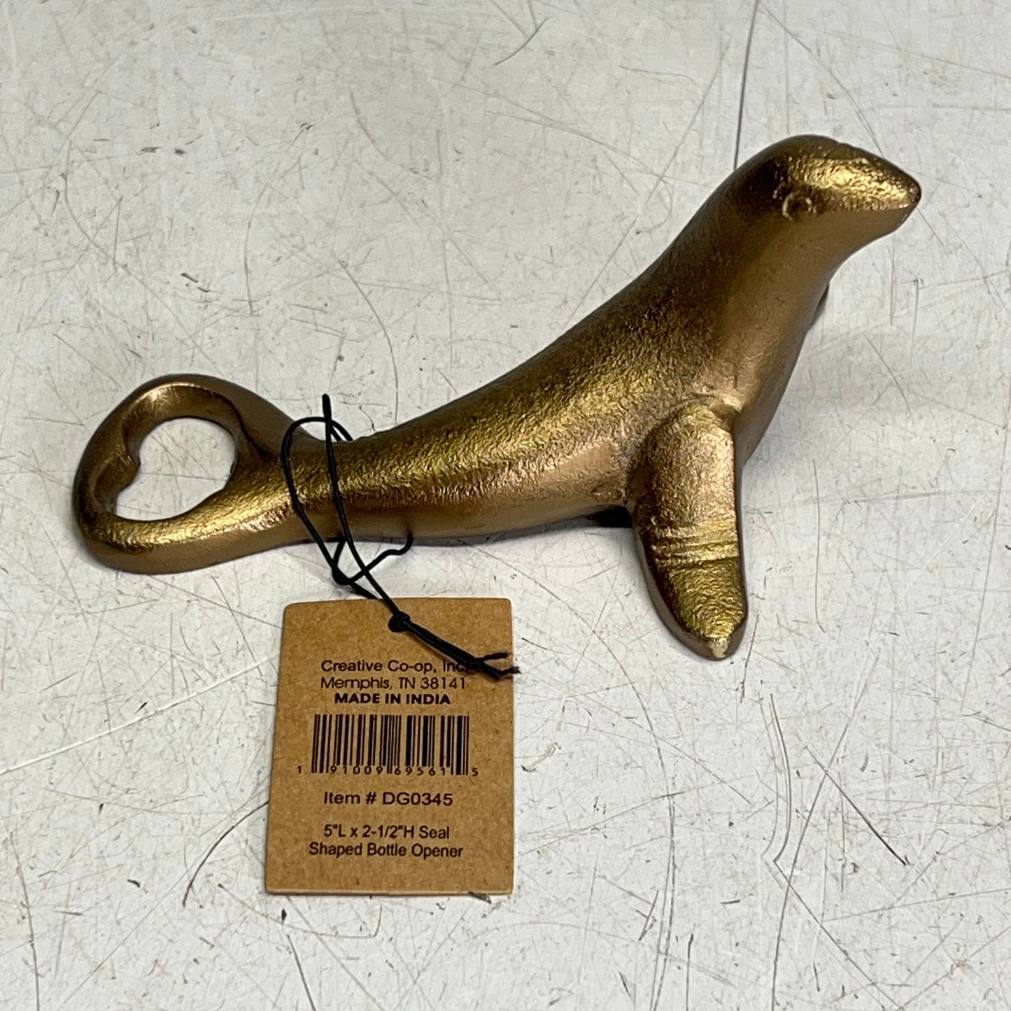 ZA@ CREATIVE CO OP Seal Shaped Bottle Opener  6" Antique Gold DG0345