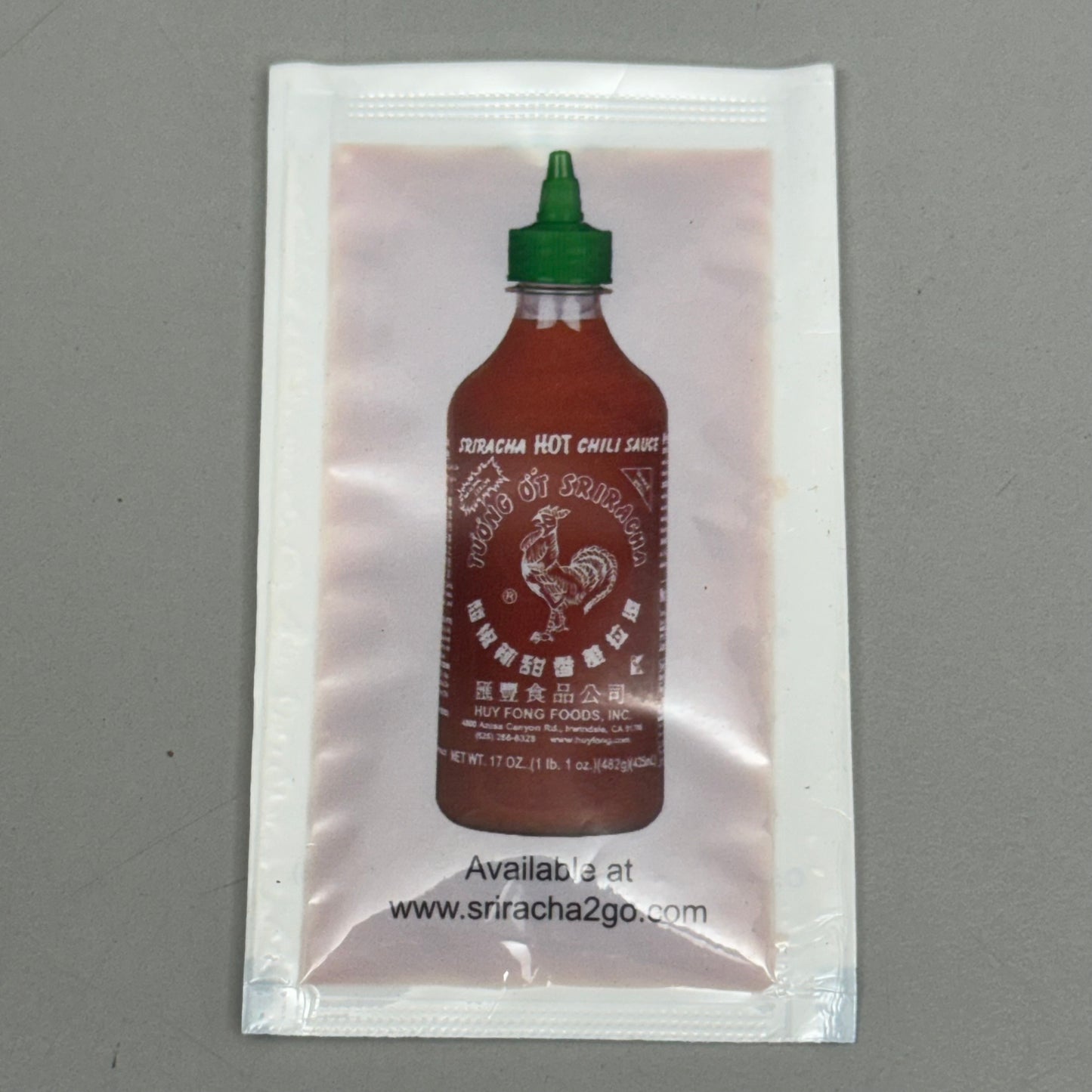 HUY FONG FOOD INC 200PK Sriracha Packets 6g  3”Lx1 1/8”W Plastic Bag White/Red Bag BB: 10/25 (Damaged Box)