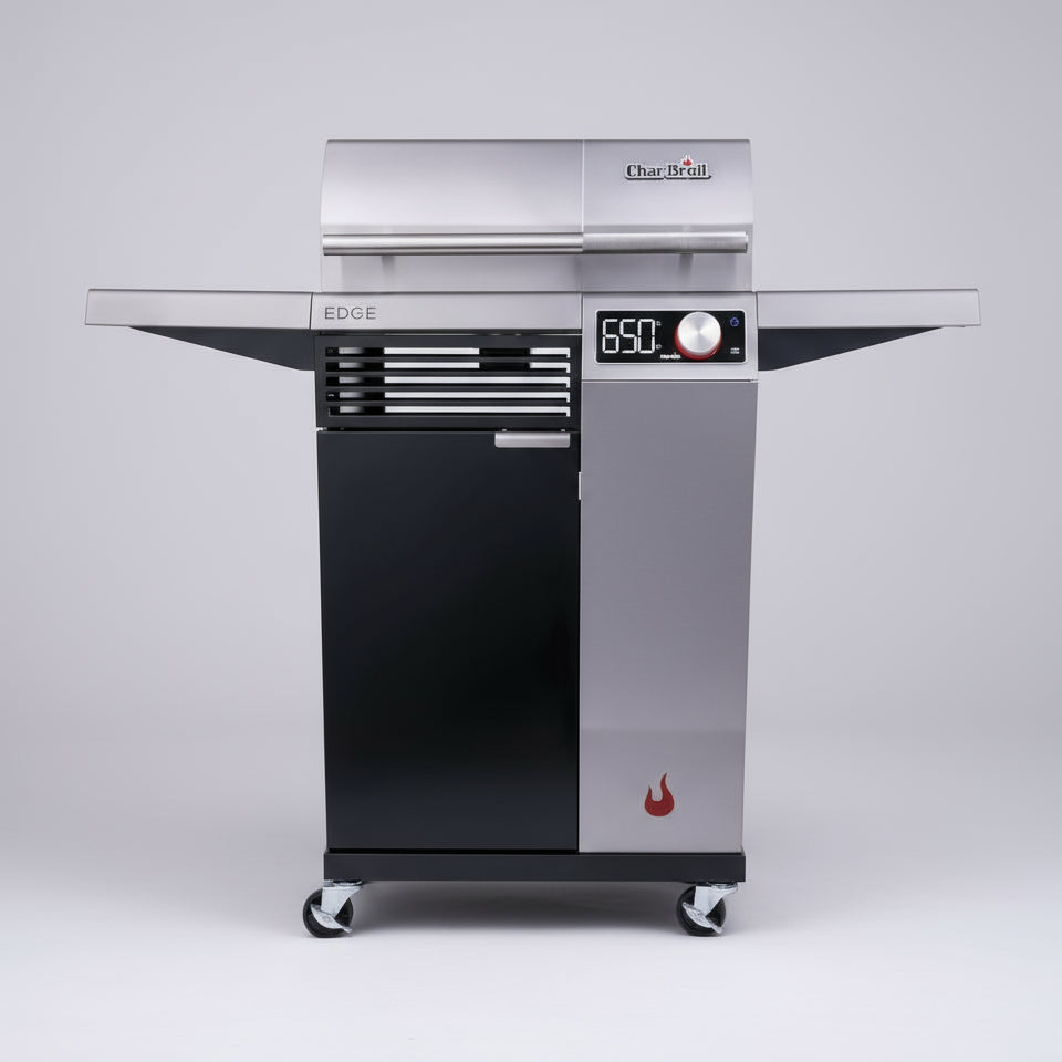 Stainless steel grill with digital display on a white background
