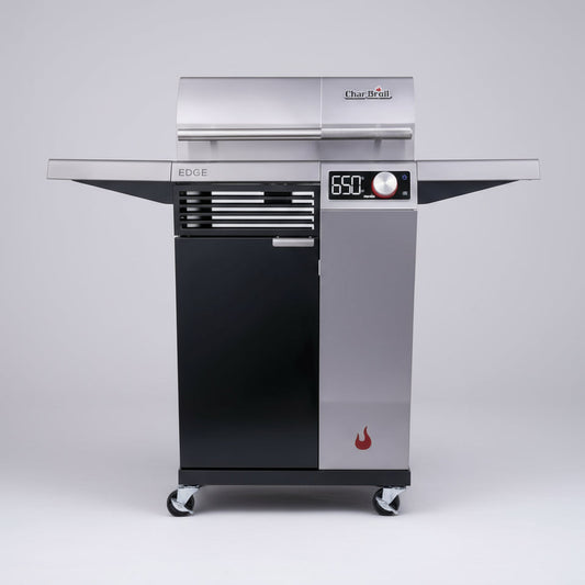 Stainless steel grill with digital display on a white background