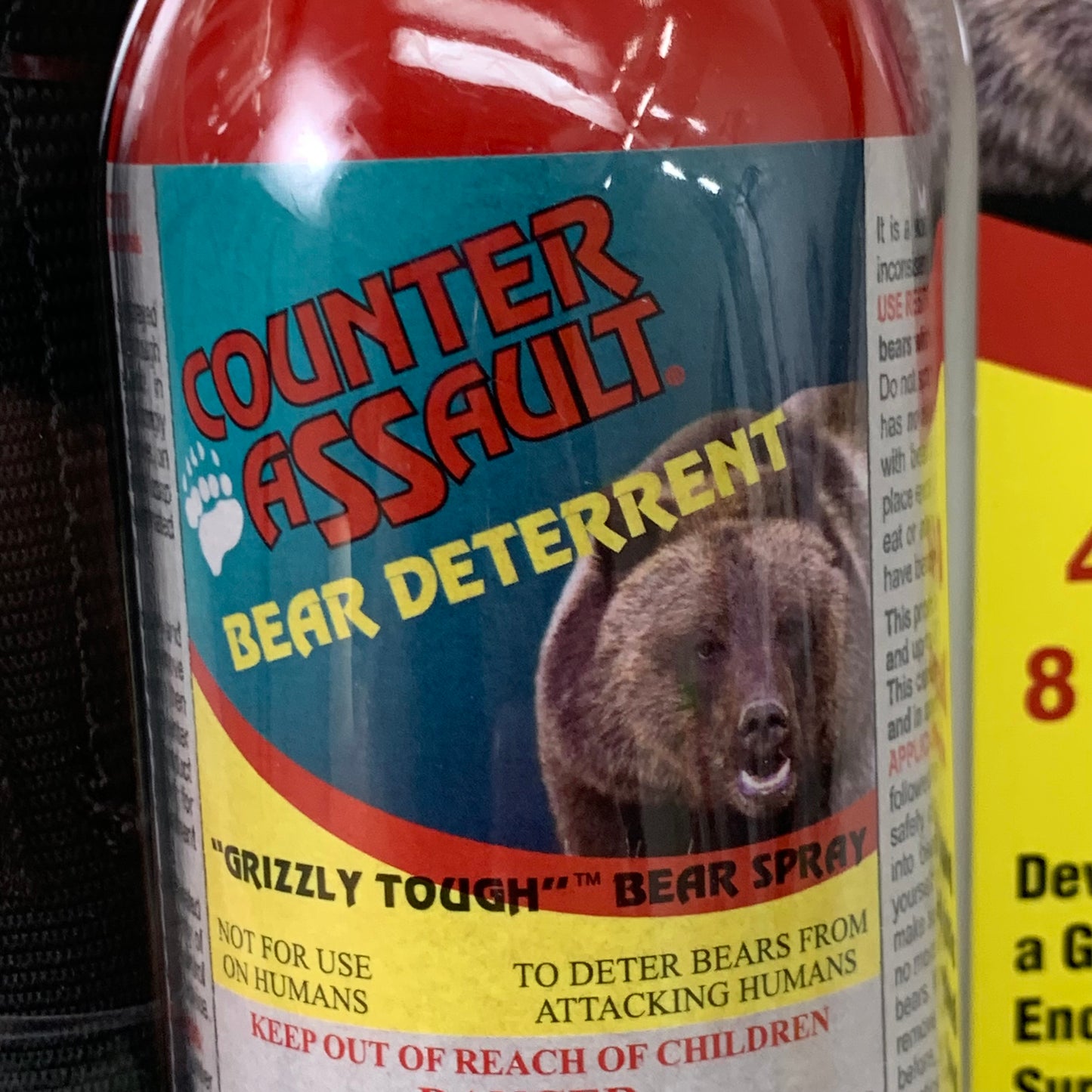 COUNTER ASSAULT Bear Spray w/ Belt Holster 40ft Spray Distance 10.2oz CA-18XH/sb