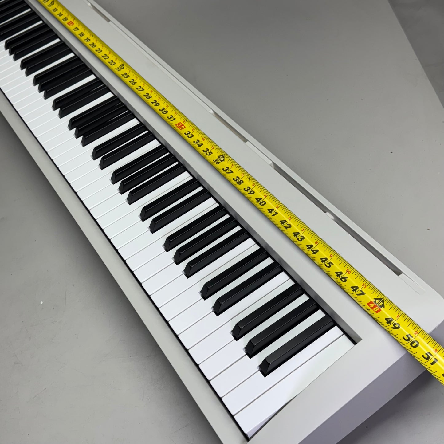 KAWAI Portable Digital Piano Sz 50” L x 10” W x 5.5” H Light Gray ES120