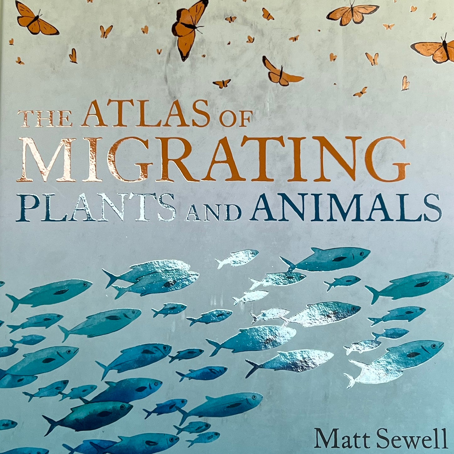 THE ATLAS OF MIGRATING PLANTS & AMINAL Hardback Book By Megan Lee (As-is)