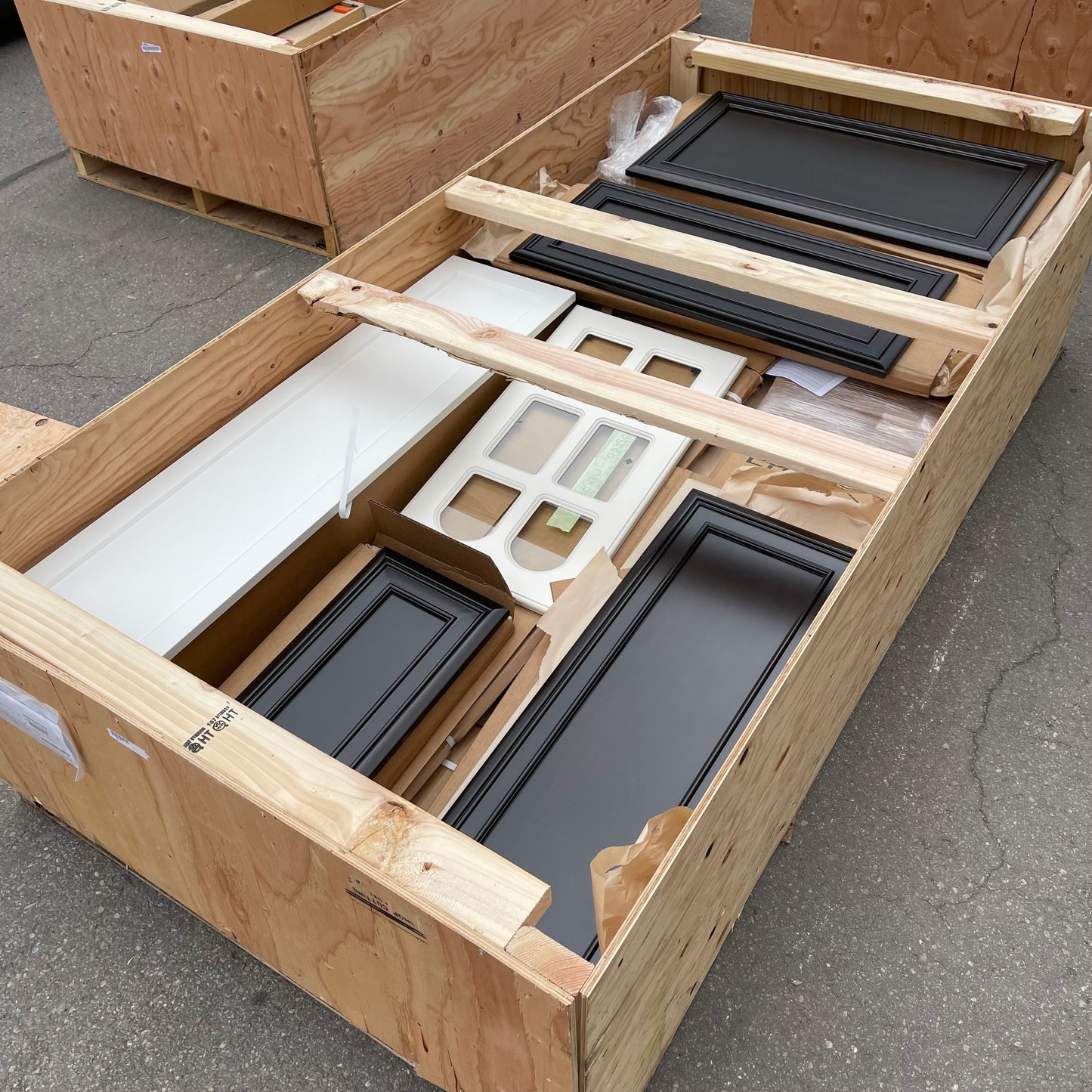 ZA@ Pallet of REBORN CABINETS Pressed Wood Cabinetry Parts Black, White, Walnut (AS-IS)