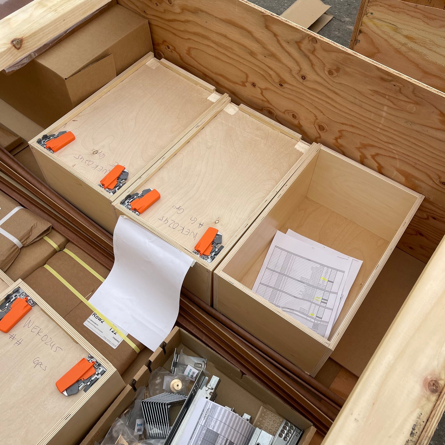 ZA@ Pallet of REBORN CABINETS Pressed Wood Cabinetry Parts Black, White, Walnut (AS-IS)