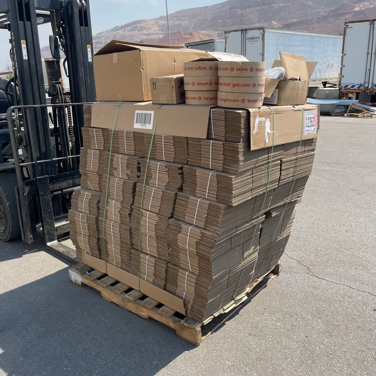 ZA@ Pallet of TARGET Cardboard Boxes, Mailers, & Kraft Paper Packing Tape (AS-IS)