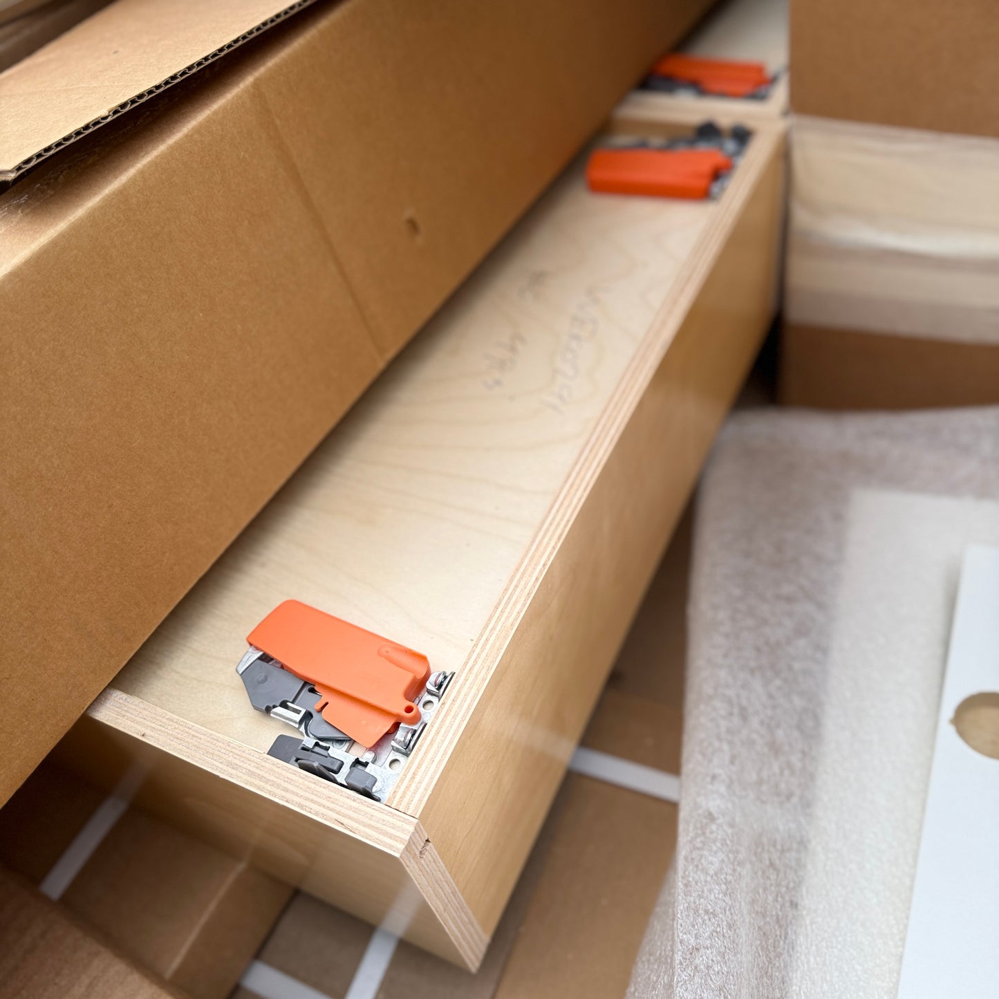 ZA@ Pallet of REBORN CABINETS Pressed Wood Cabinetry Parts Black, White (AS-IS)