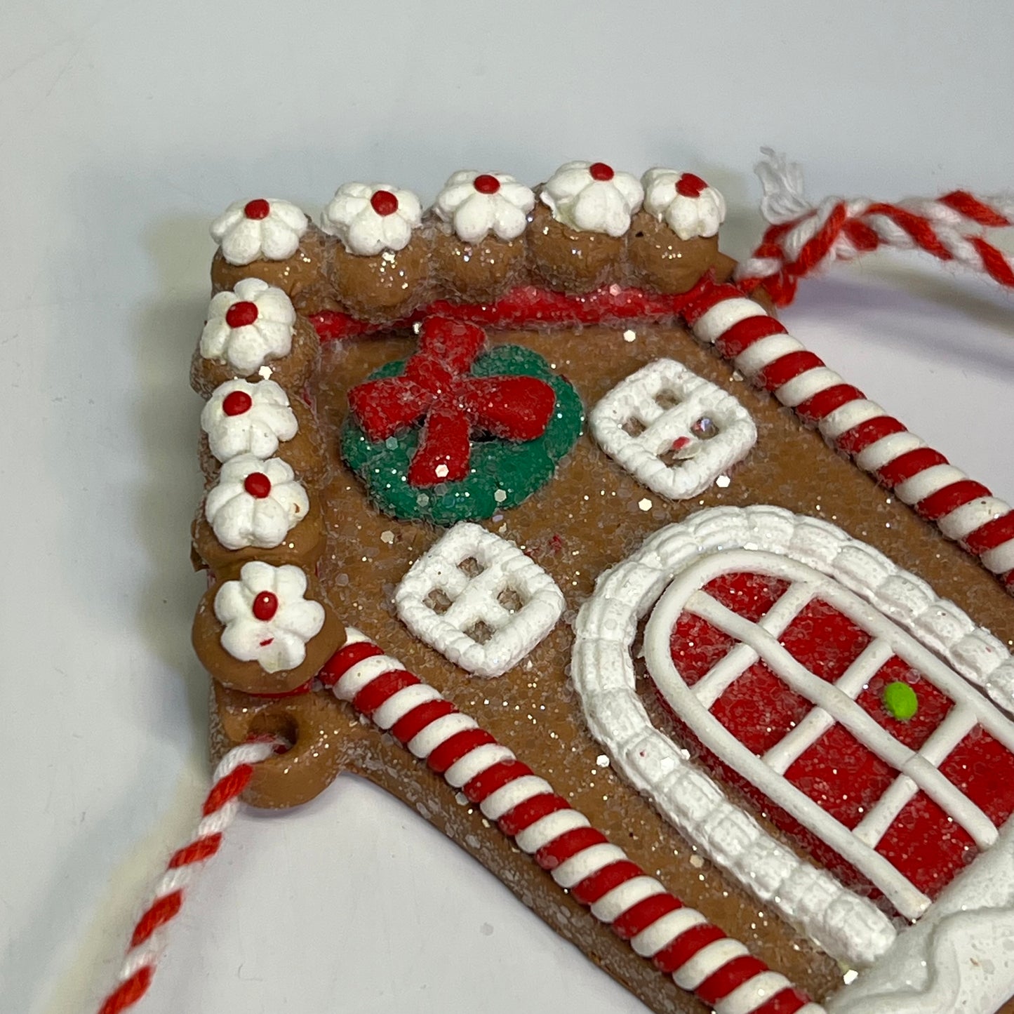 GERSON Clay Gingerbread & Houses Garland 24" L Brown/White/Red 2497210