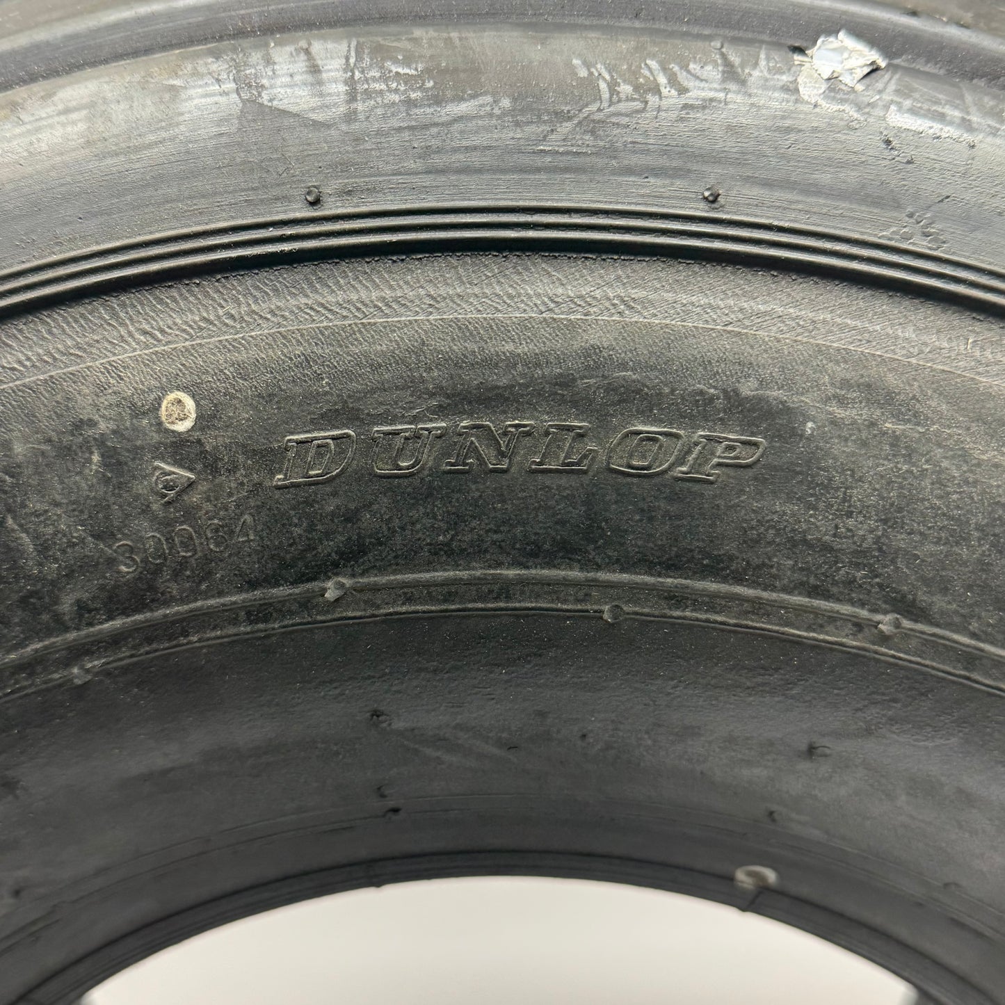 ZA@ DUNLOP Airplane Tire Sz 24 X 7.7 (AS-IS, Used & With Patch)