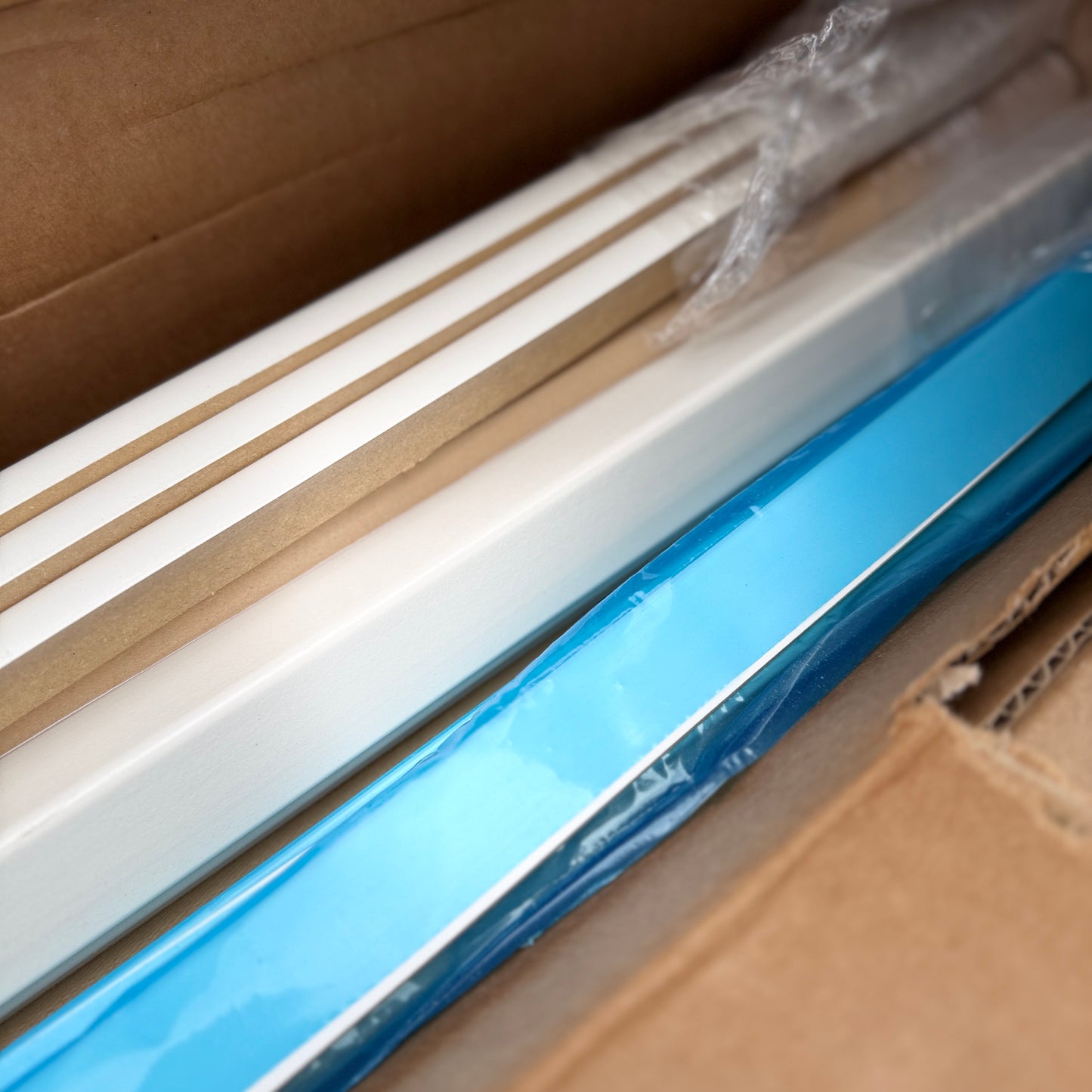 ZA@ Pallet of REBORN CABINETS Pressed Wood Cabinetry Parts Black, White (AS-IS)