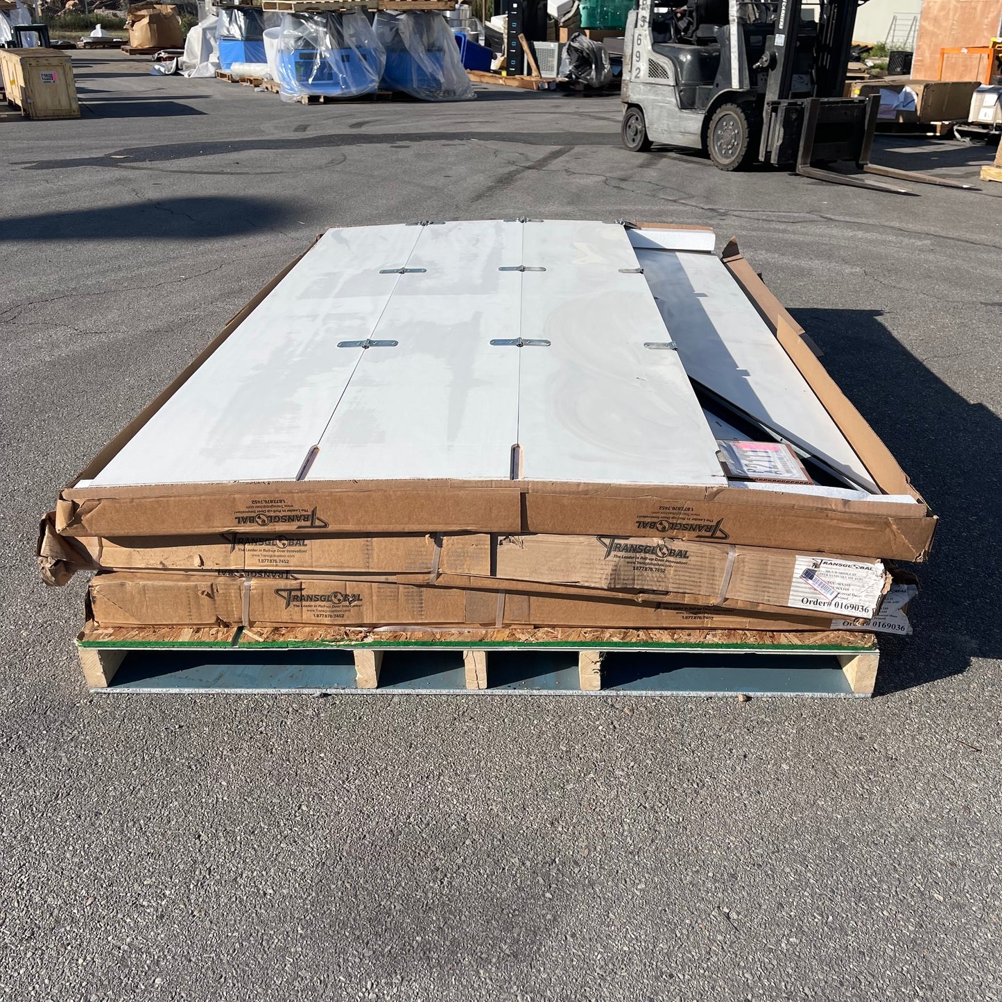 ZA@ Pallet of TRANSGLOBAL Roll-up Doors & Hardware 96”x105” White TGU96X105 (AS-IS)