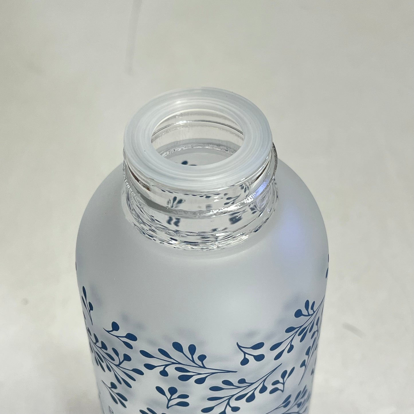 ZA@ CHRISTIAN ART GIFTS Saved by Grace Botanical Glass Water Bottle 19 fl oz  Clear/Lilac WBT245