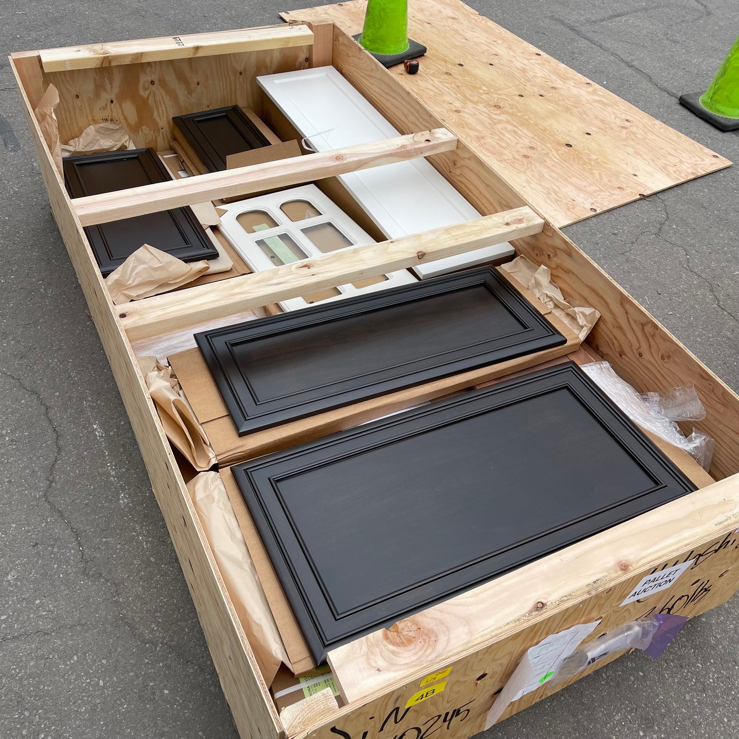 ZA@ Pallet of REBORN CABINETS Pressed Wood Cabinetry Parts Black, White, Walnut (AS-IS)