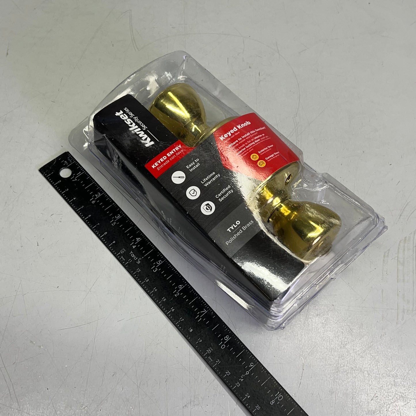 KWIKSET Tylo Polished Brass Entry Door Knob 1-1/3" Polished Brass 94002-828