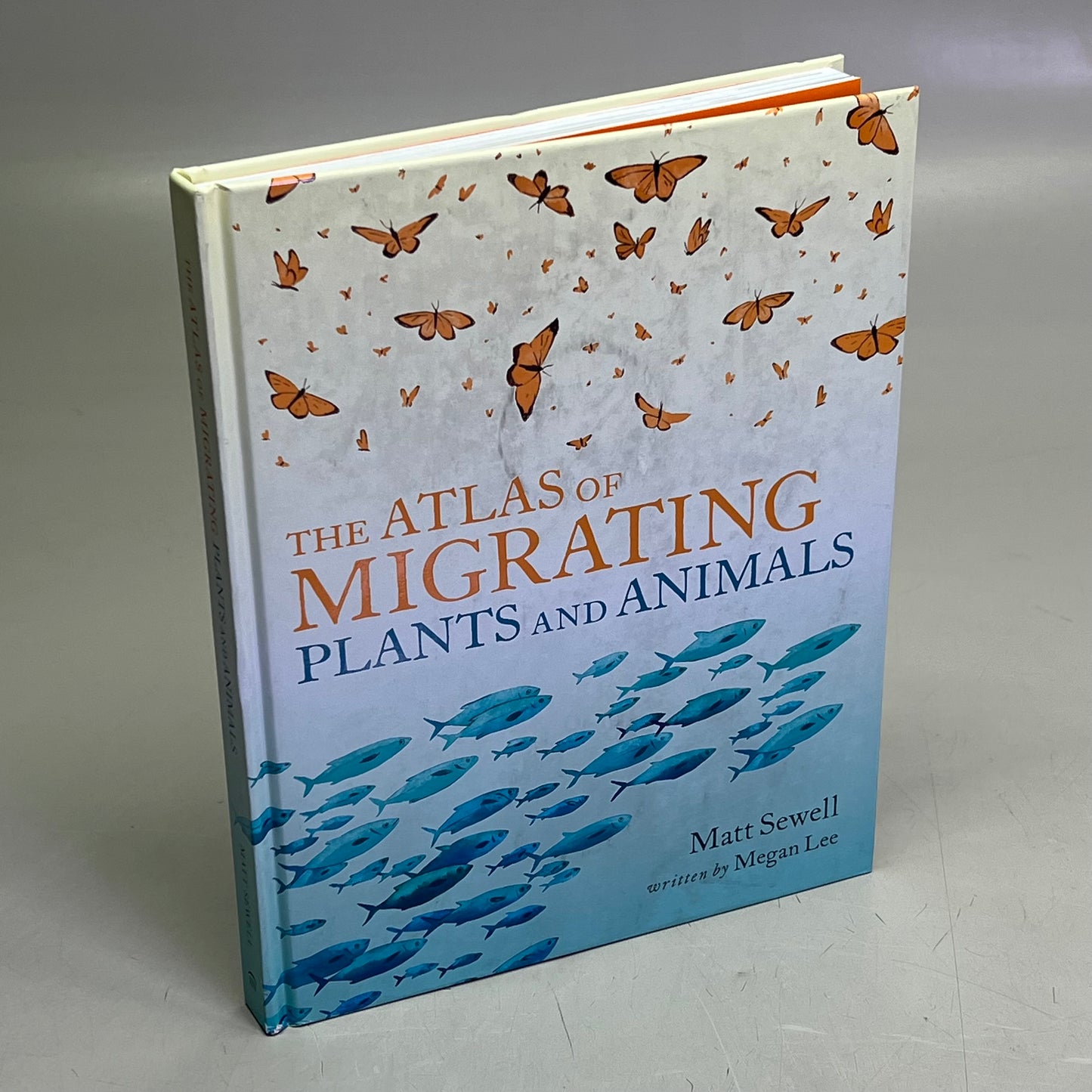 THE ATLAS OF MIGRATING PLANTS & AMINAL Hardback Book By Megan Lee (As-is)
