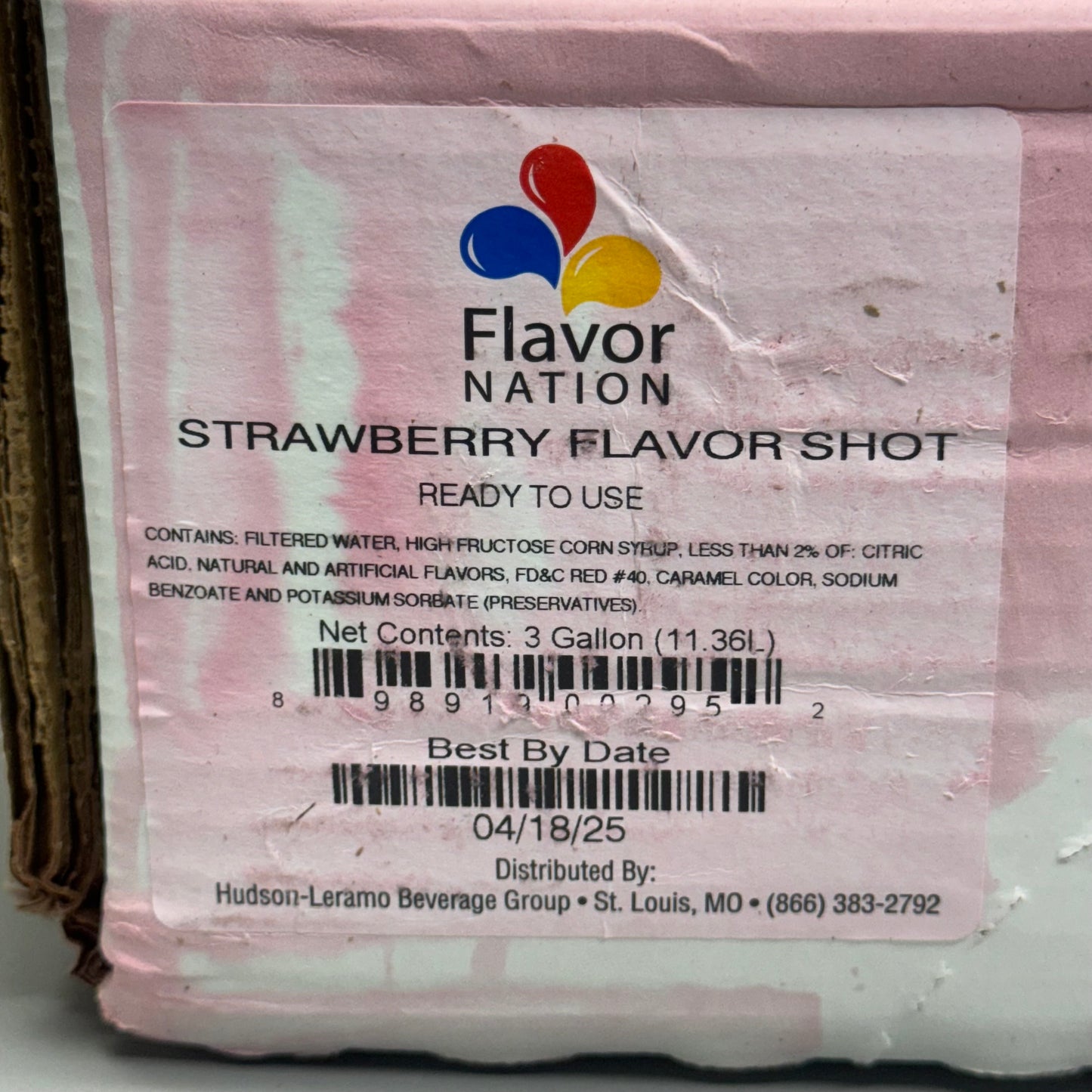 FLAVOR NATION Strawberry Flavor Shot 3 Gallon BB: 04/25, 18”Lx14”W, Plastic Bag, Pink (The Box Is Stained)