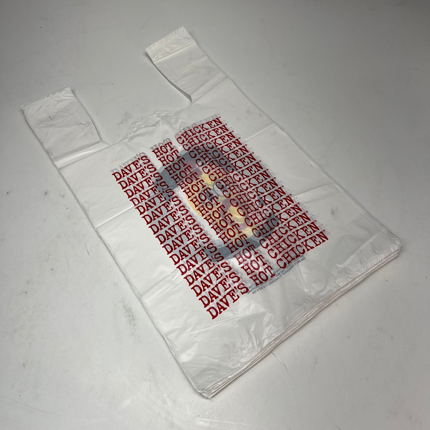 ZA@ DAVE'S HOT CHICKEN (1200 PACK) Plastic Takeout Bags 22x13x8" White 138221200DHC