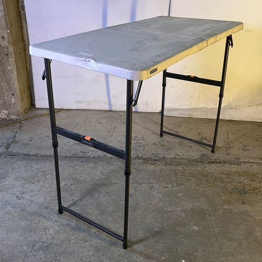 ZA@ LIFETIME Classic Folding Table Sz 47"L x 23.5"W x 38"H, Grey (AS-IS, A Little Damage))