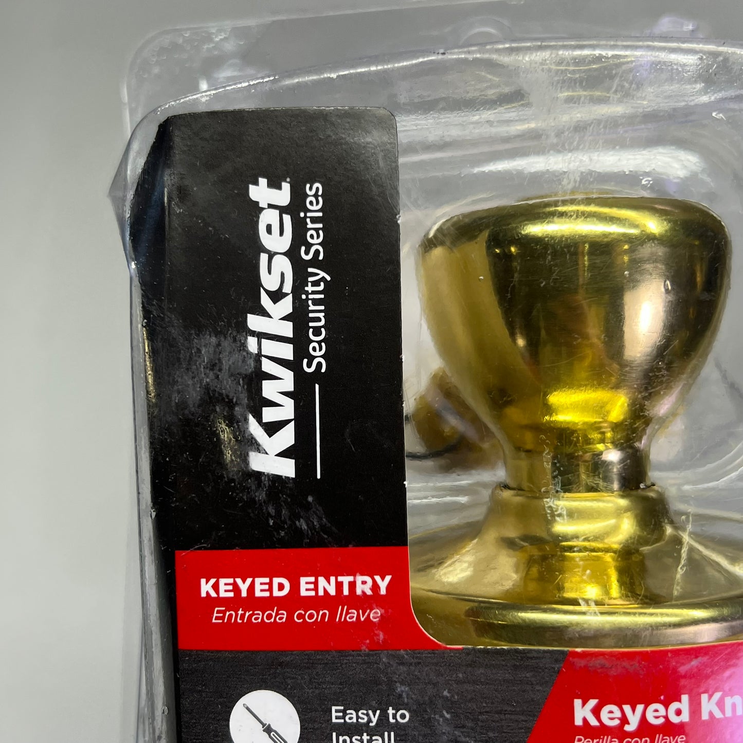 KWIKSET Tylo Polished Brass Entry Door Knob 1-1/3" Polished Brass 94002-828