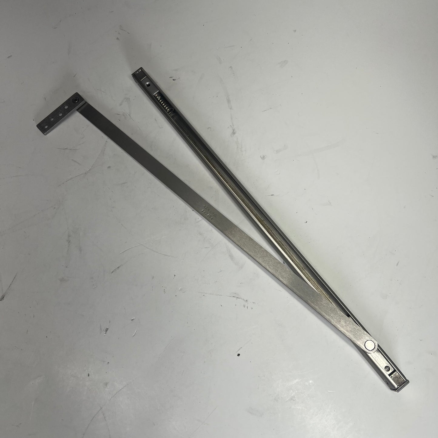 ARCHITECTURAL BUILDERS 4400 Series Surface Mount Overhead Stop & Holder 4424RA