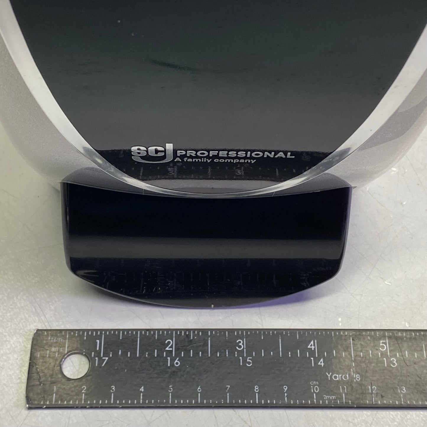 SCJ PROFESSIONAL 1 Liter Transparent Black And Chrome Soap Manual Dispenser 9"H x 5"L x 4.5"W TPB1LDSO