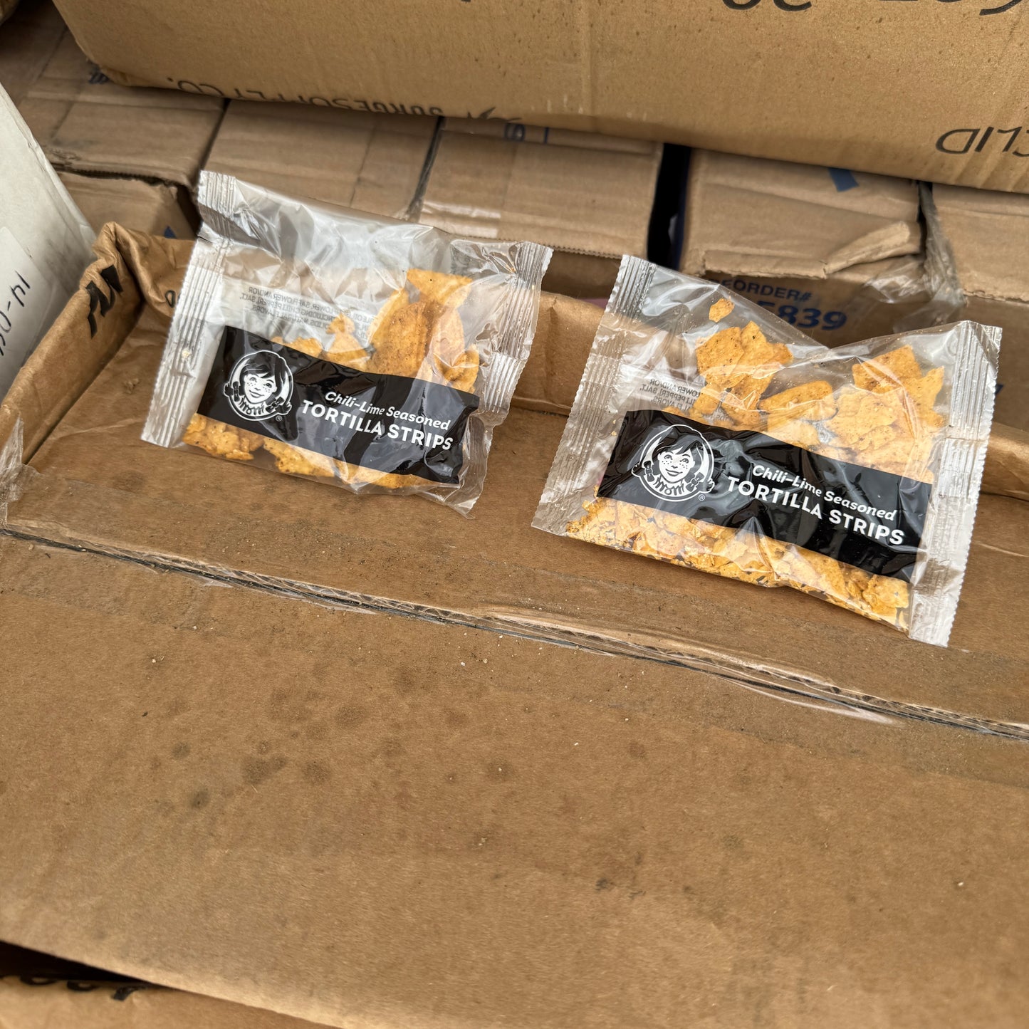 ZA@ Pallet of FIRST MARK Clear Lids, Black Hot Cup Lids, Tortilla Strips, & Toilet Seat Covers