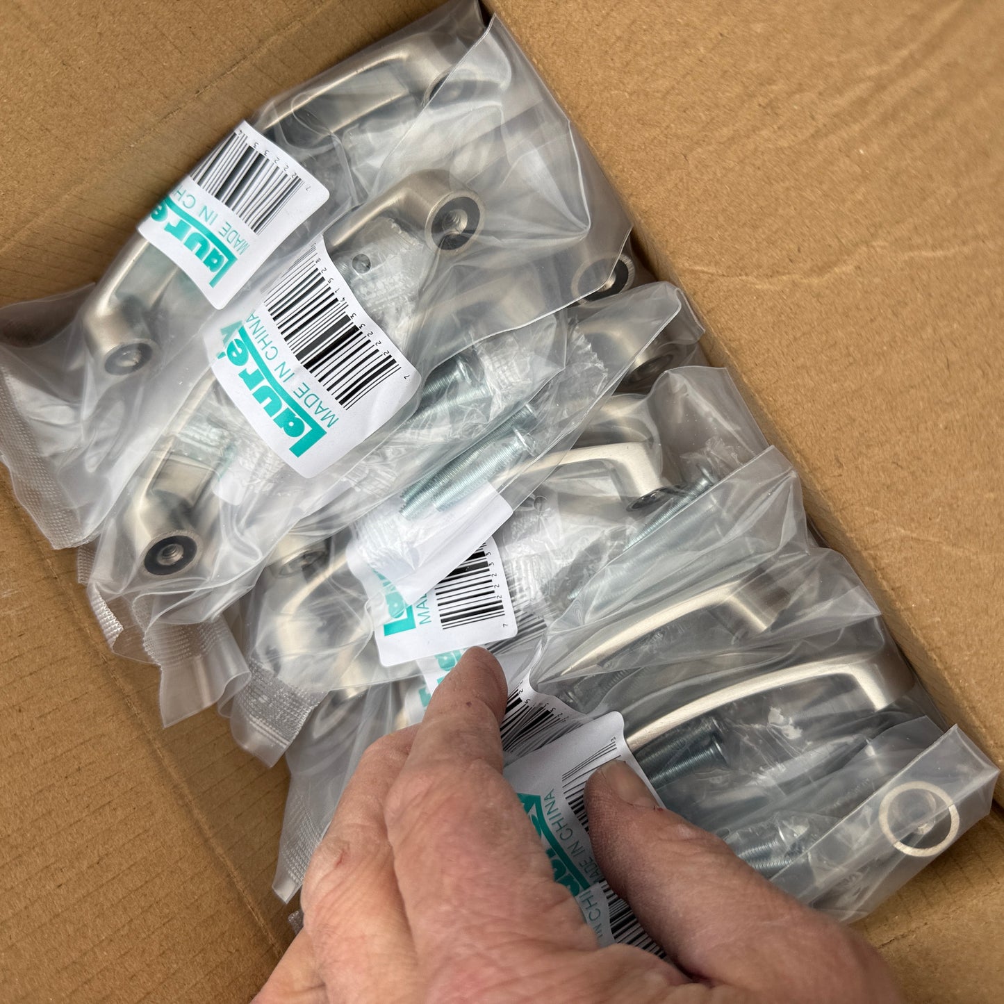 ZA@ Pallet of REBORN CABINETS Pressed Wood Cabinetry Parts Black, White (AS-IS)