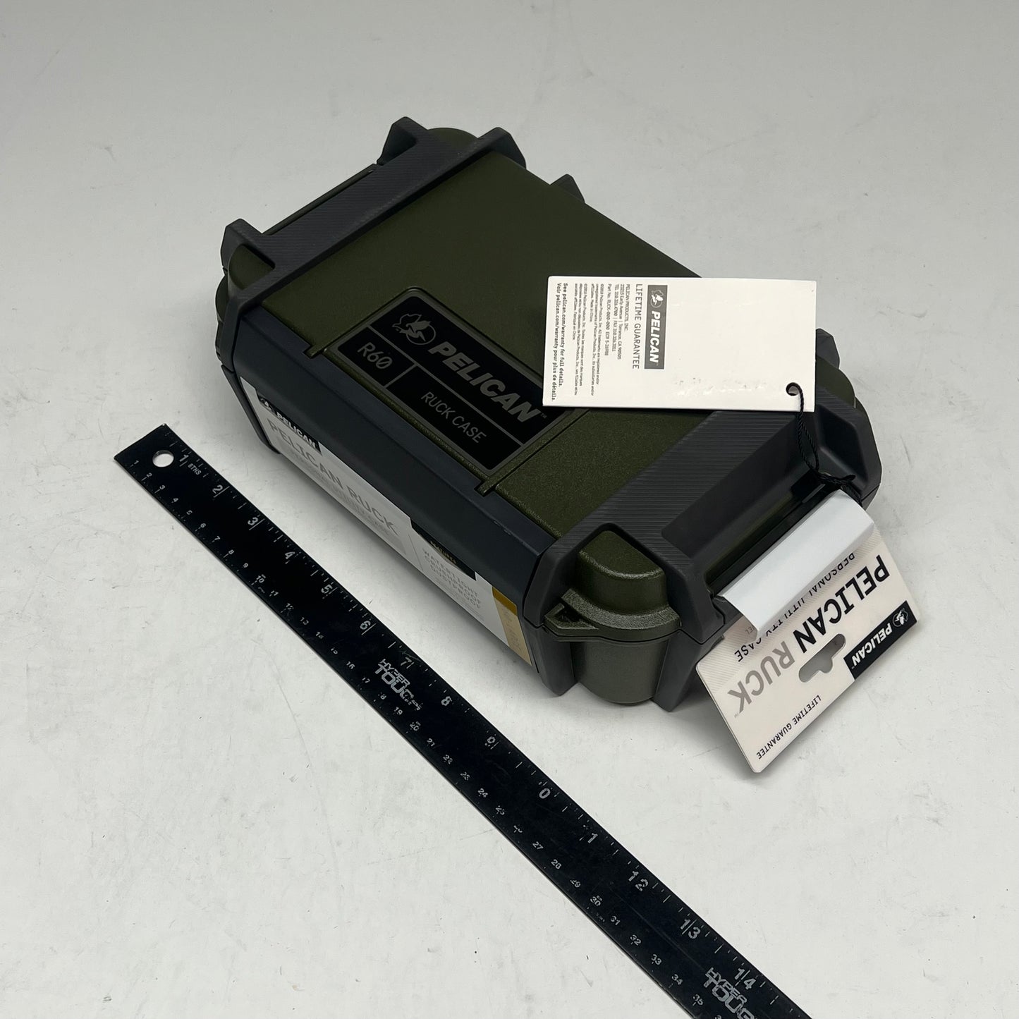 PELICAN  Ruck R60 Case Crushproof 11.14x6.86x3.88" OD Green RKR600-0000-OD