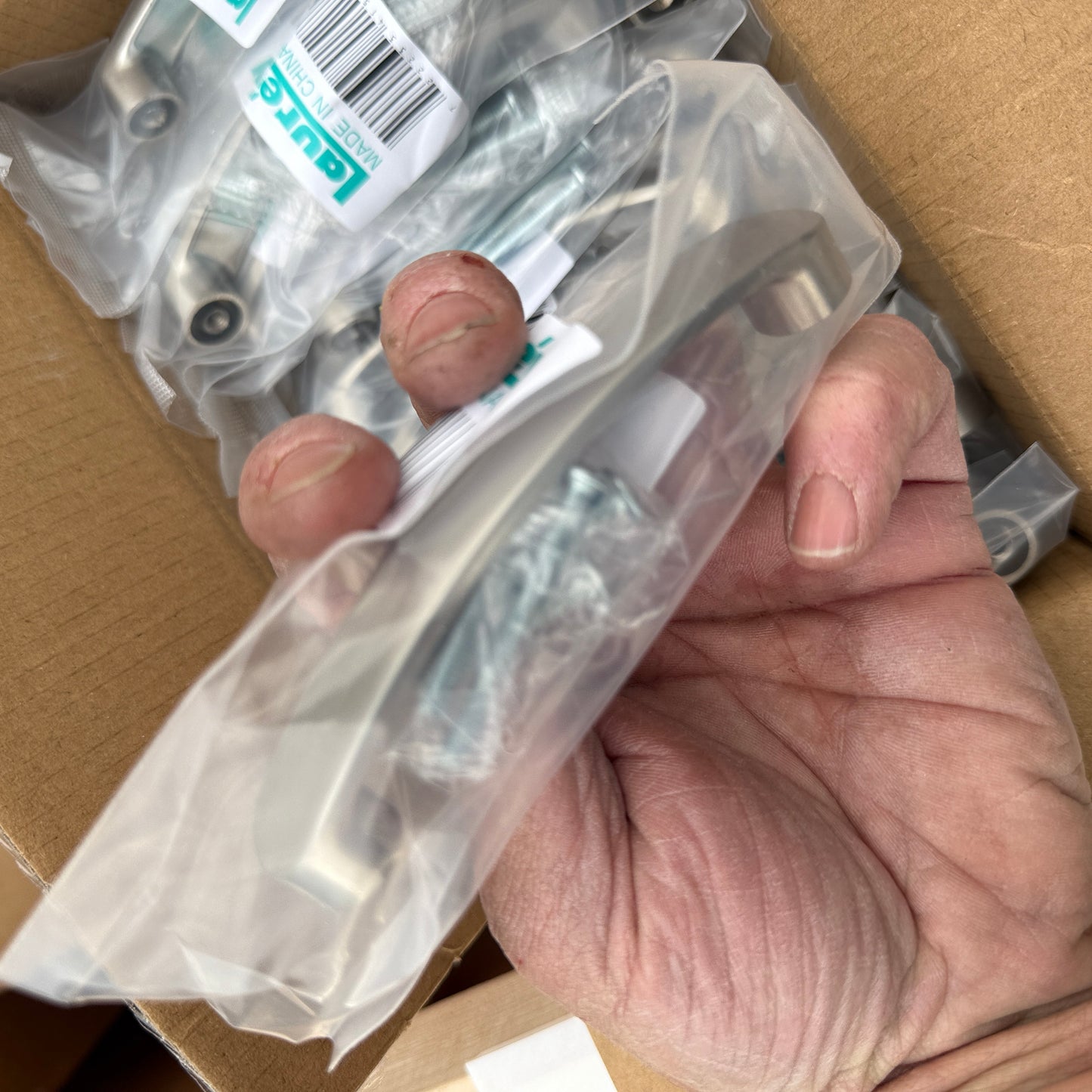 ZA@ Pallet of REBORN CABINETS Pressed Wood Cabinetry Parts Black, White (AS-IS)