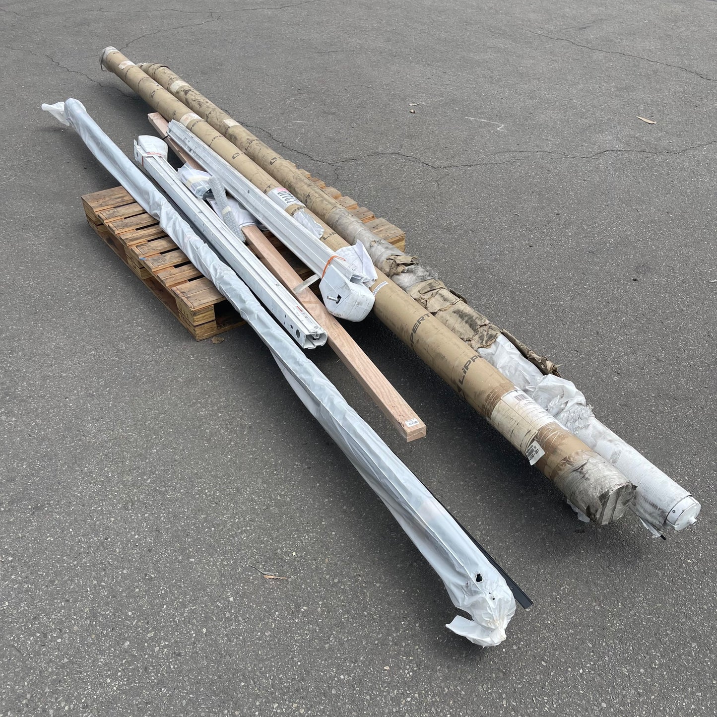 ZA@ Pallet of MIXED Awning Parts & Wood Board (AS-IS)