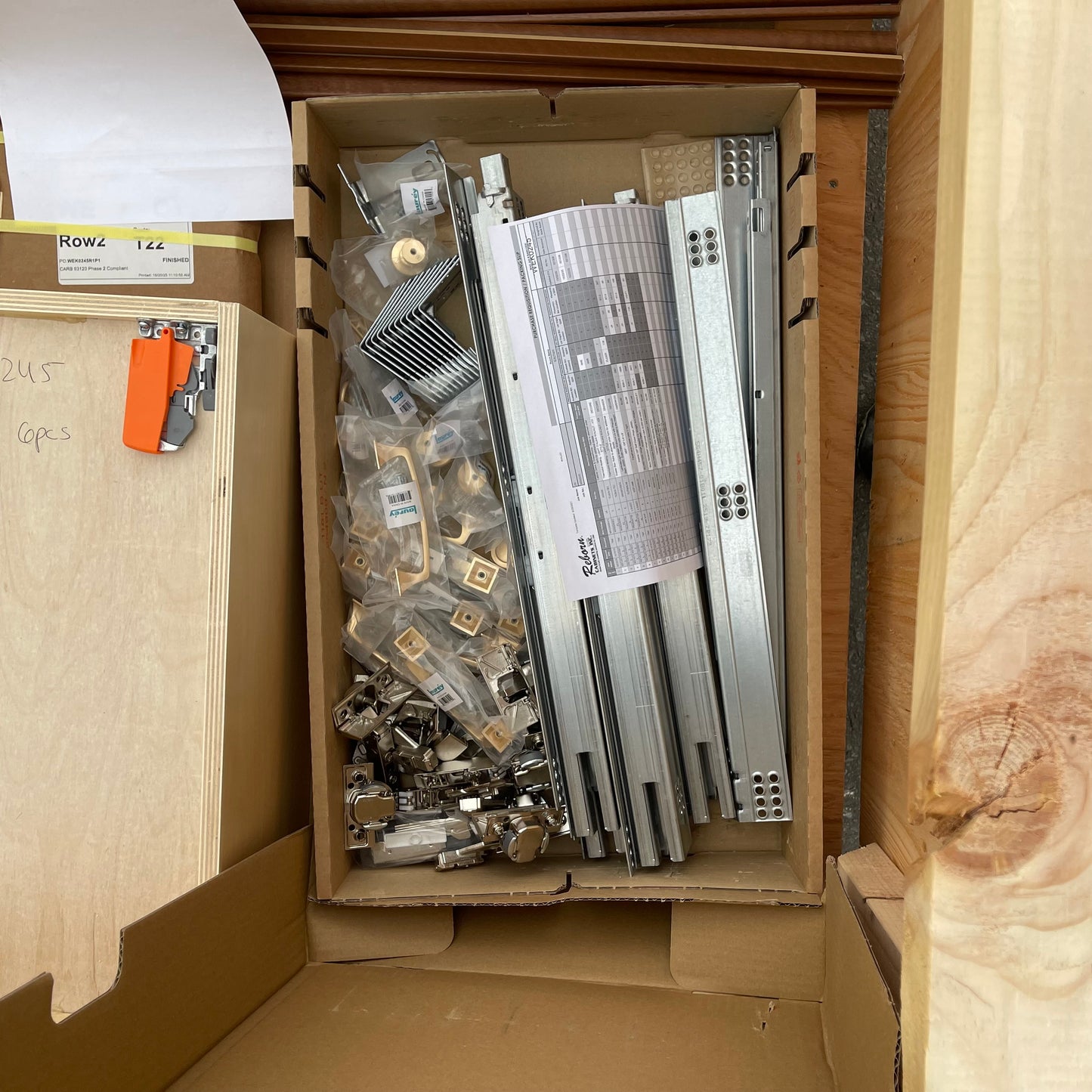 ZA@ Pallet of REBORN CABINETS Pressed Wood Cabinetry Parts Black, White, Walnut (AS-IS)