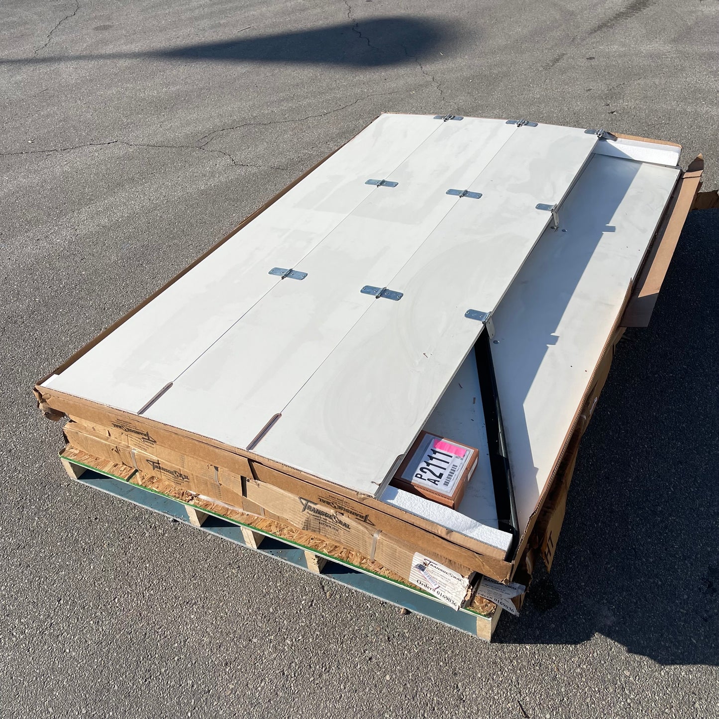 ZA@ Pallet of TRANSGLOBAL Roll-up Doors & Hardware 96”x105” White TGU96X105 (AS-IS)