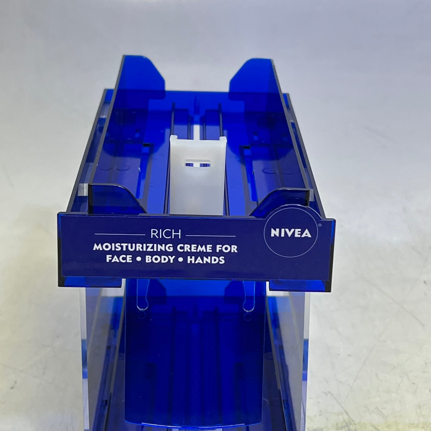 ZA@ NIVEA Round Cream Slide Dispenser 8"x7"x4" Blue/White