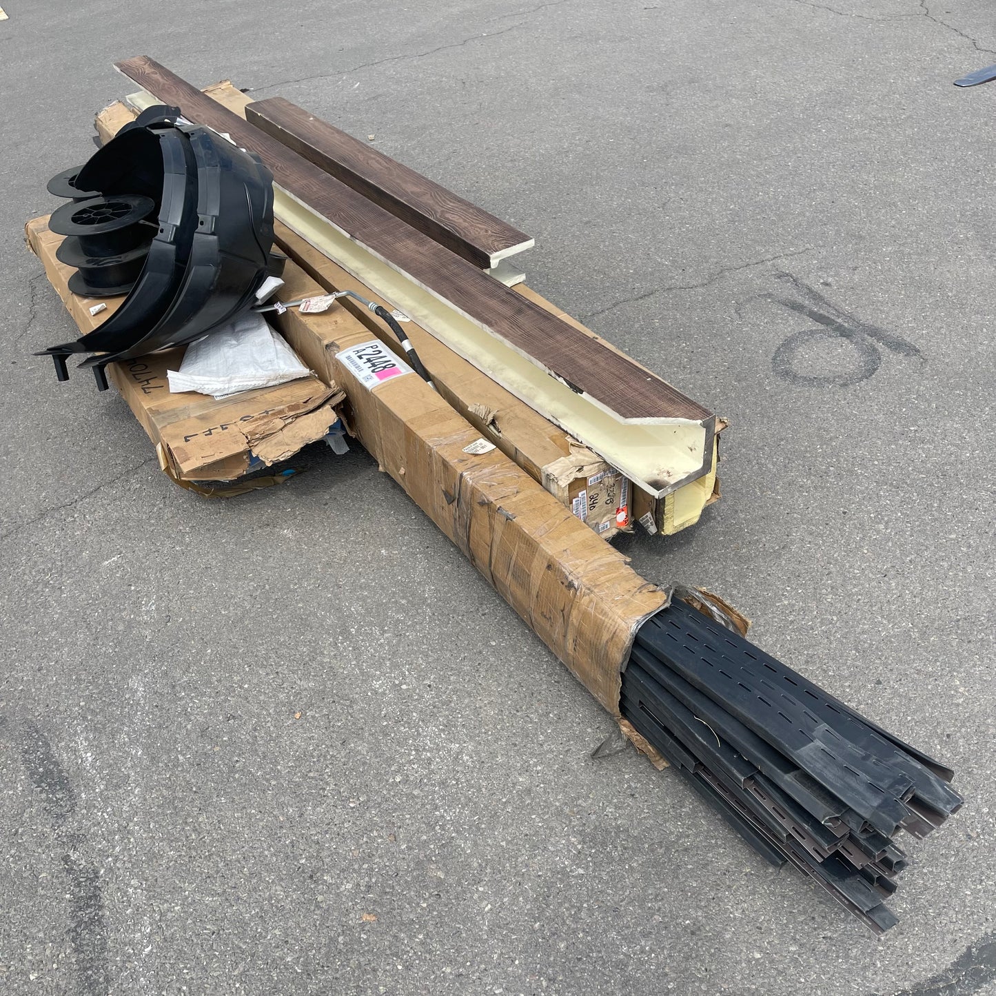ZA@ Pallet of MIXED Plastic Channels, Faux Wood Trim, Fender Liners, Shelf Parts, & More! (AS-IS)