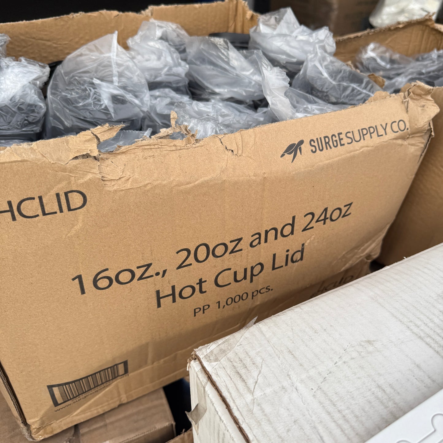 ZA@ Pallet of FIRST MARK Clear Lids, Black Hot Cup Lids, Tortilla Strips, & Toilet Seat Covers